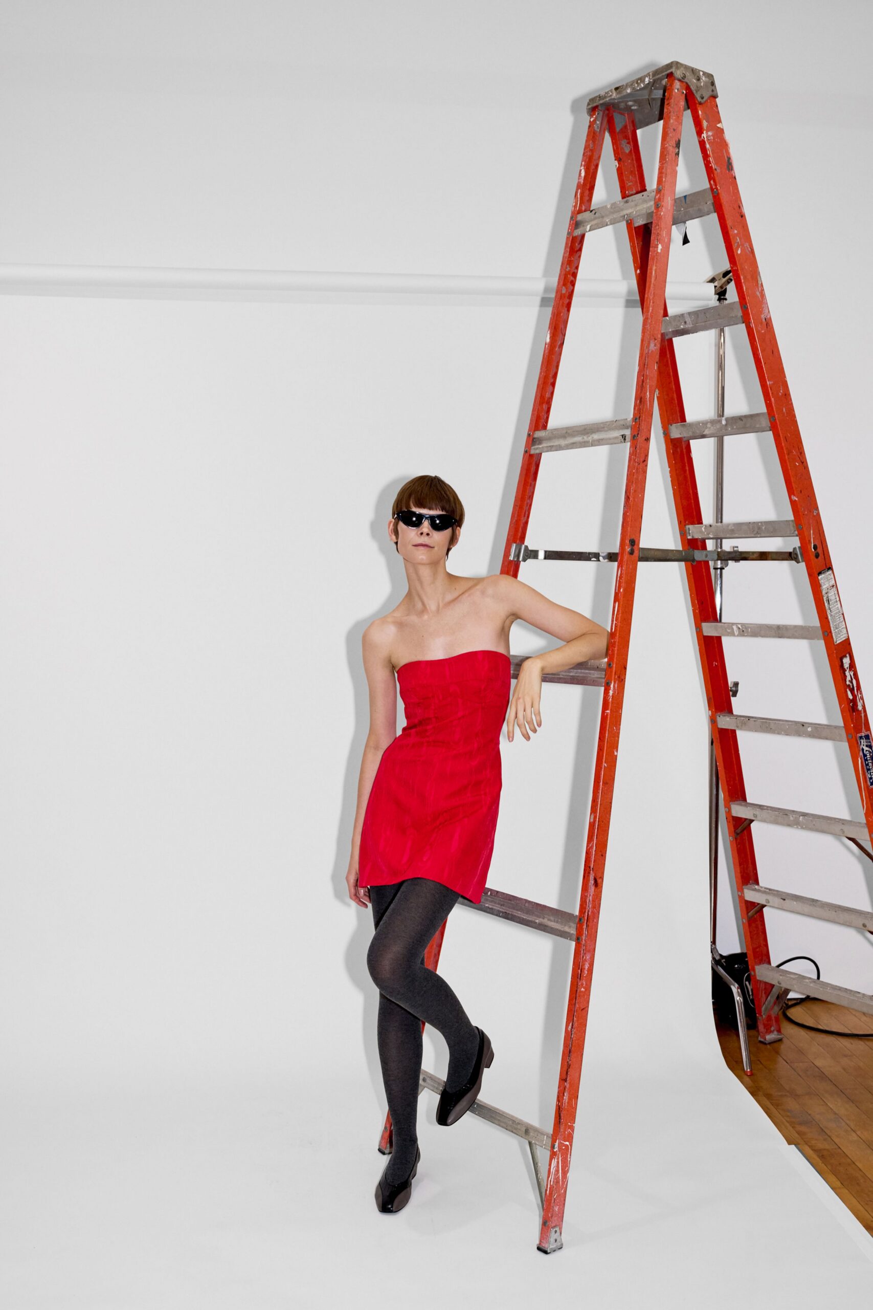 red cotton strapless fitted mini dress