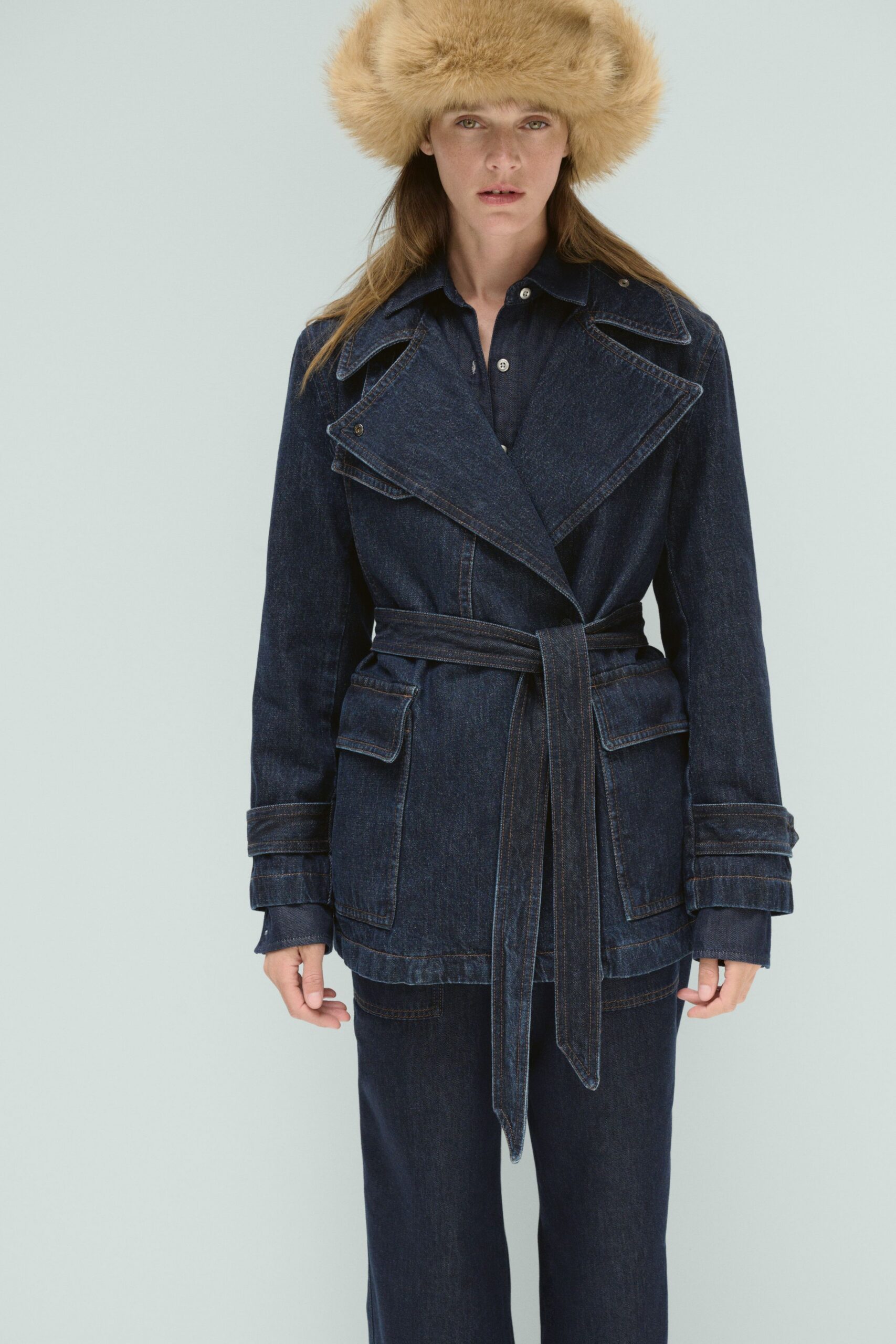 blue denim jacket with fur hat