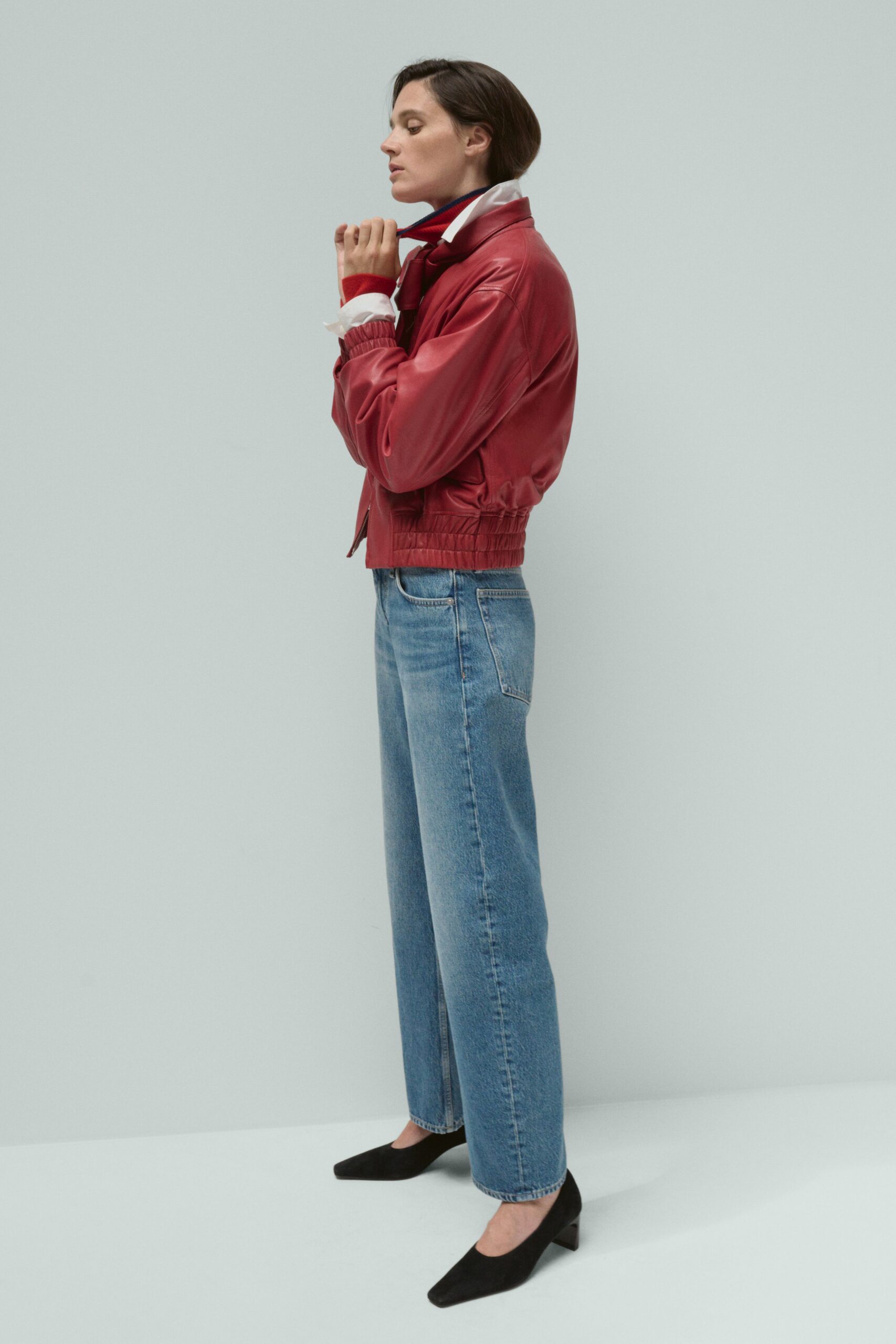 red leather long-sleeve collared fitted zippered jacket