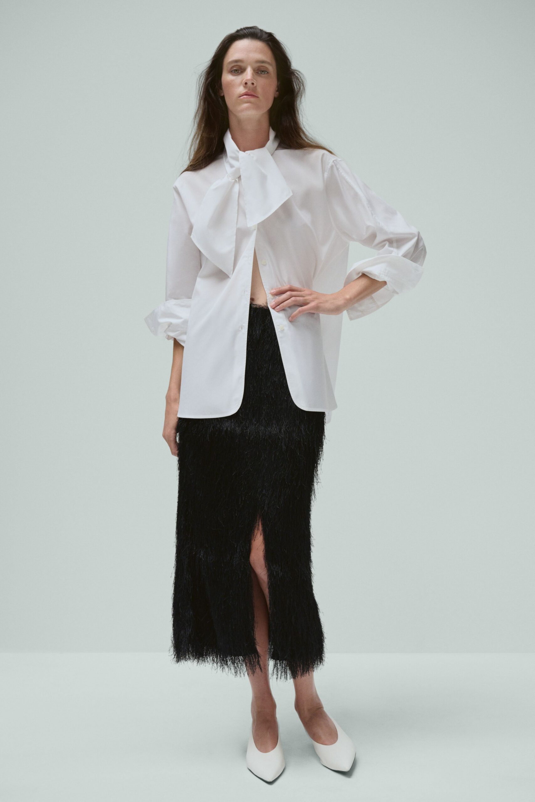 white cotton long-sleeve collared relaxed pleated shirt