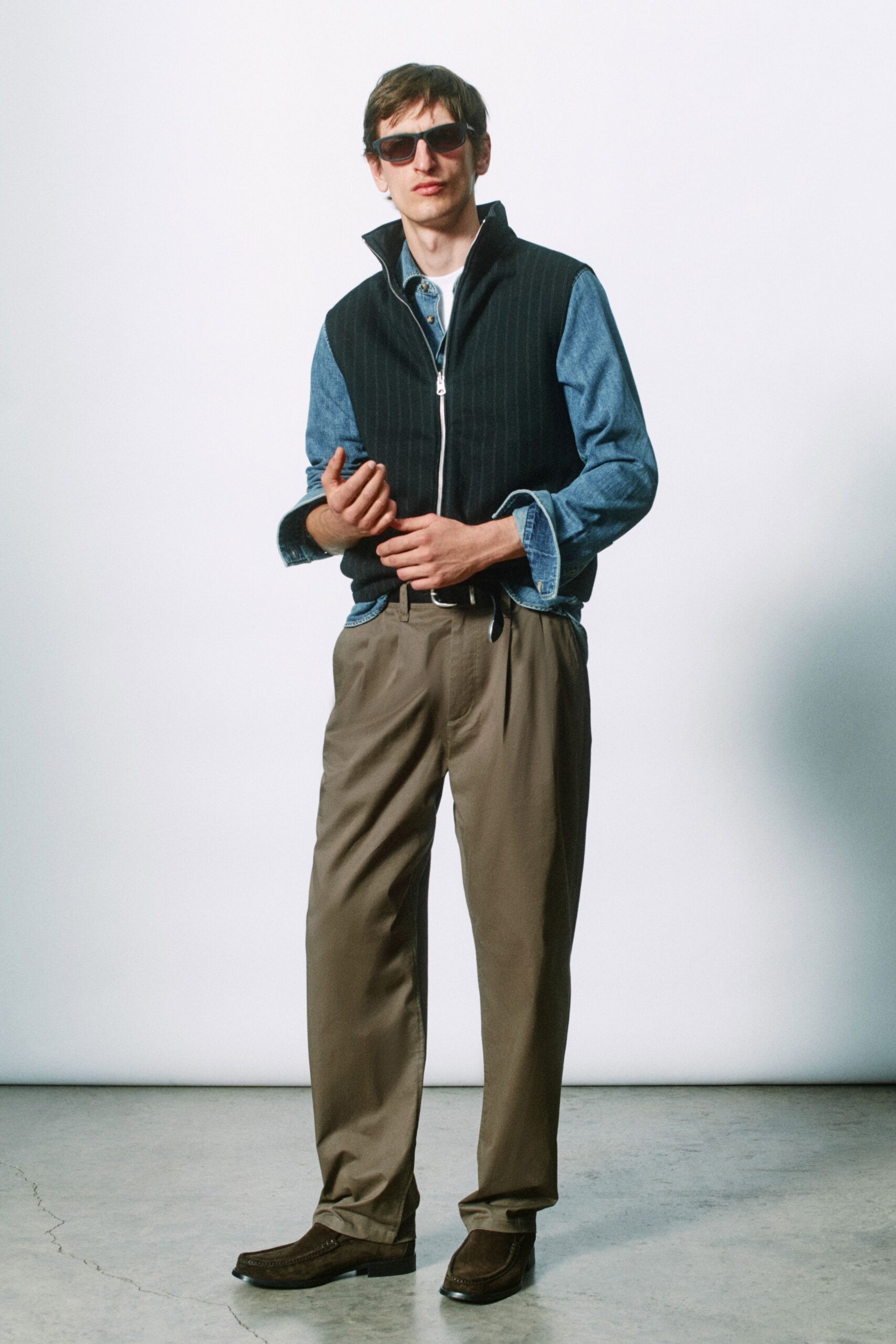 black fitted vest with denim shirt