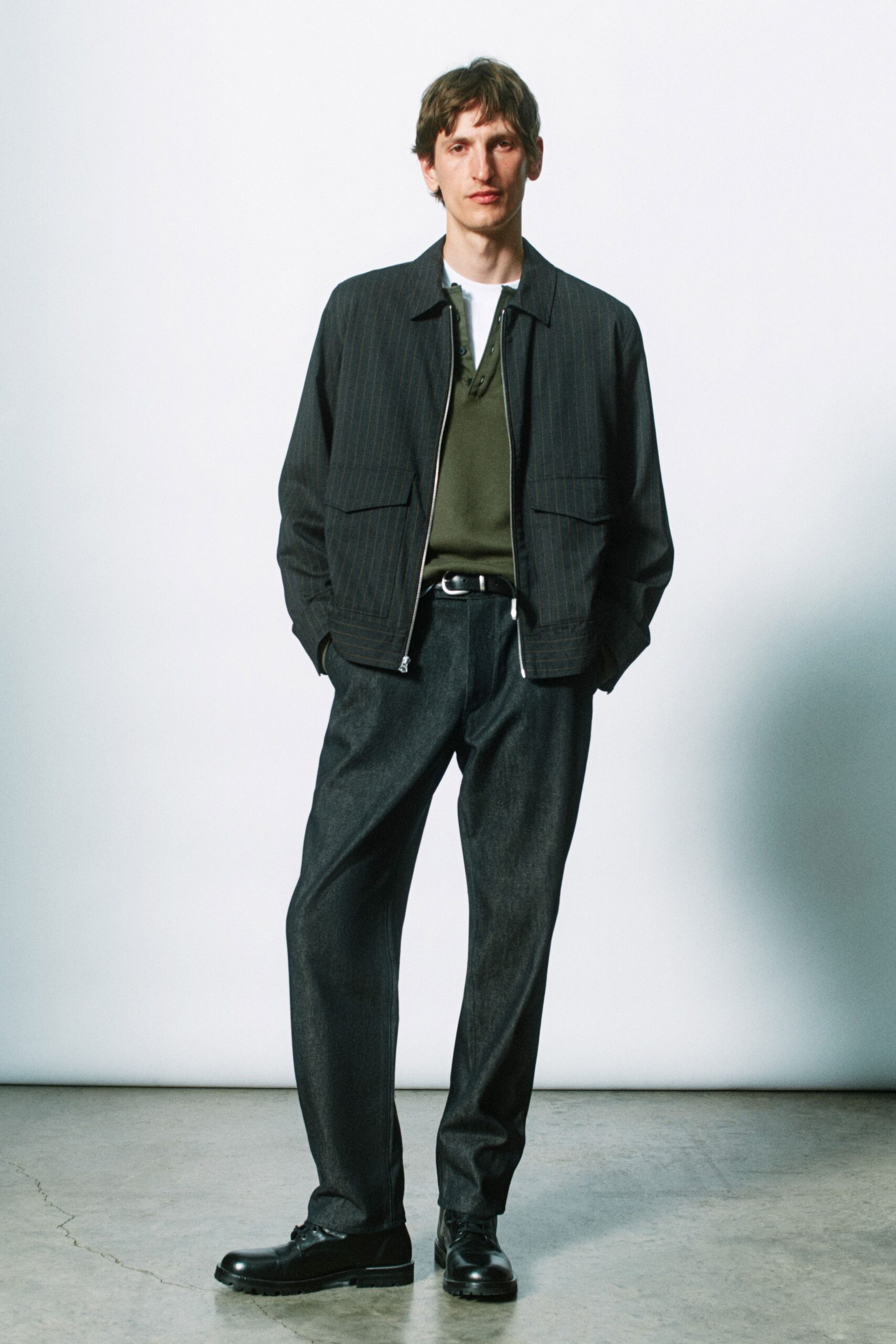 relaxed black jacket with green shirt