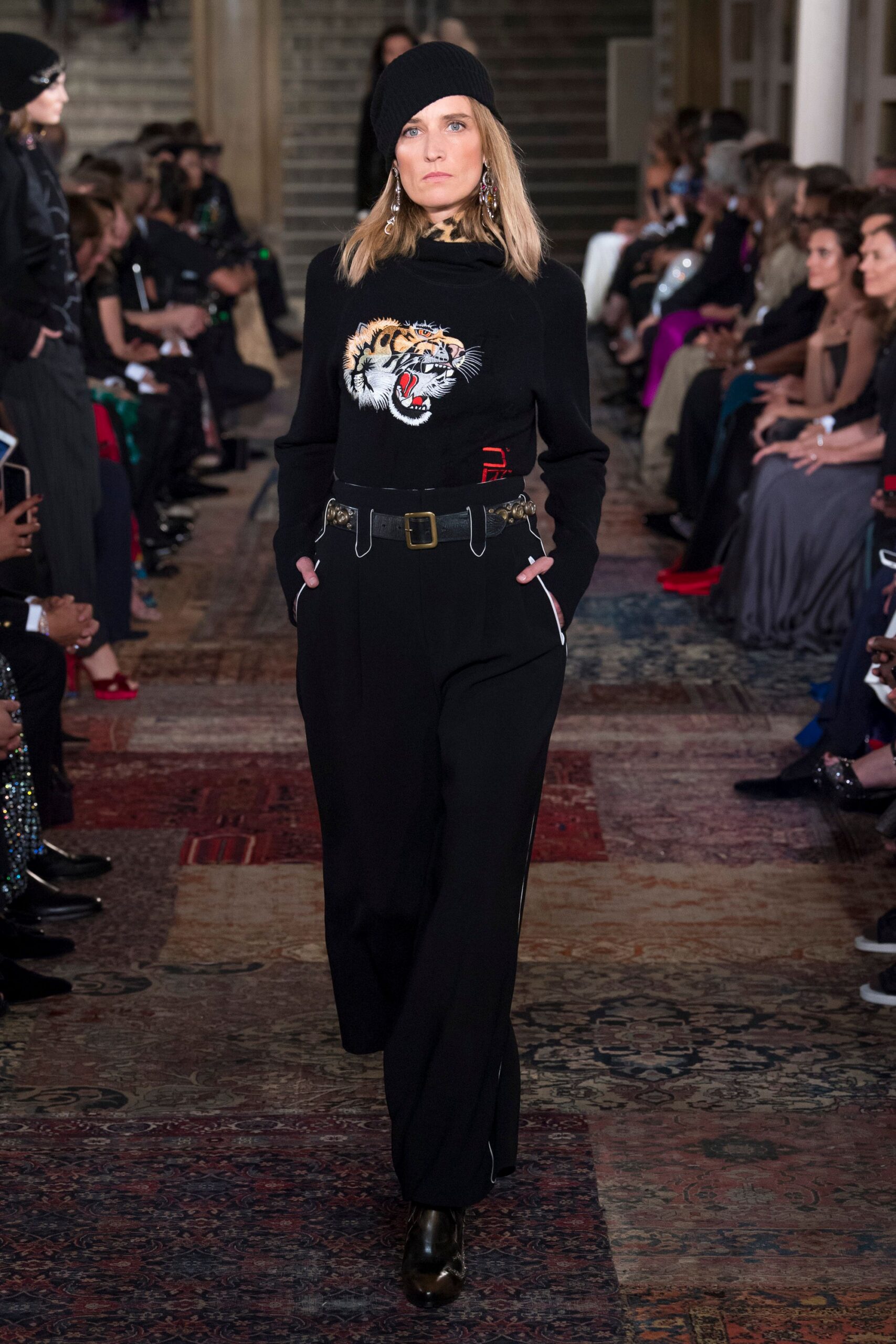black fitted jumpsuit with embroidered details