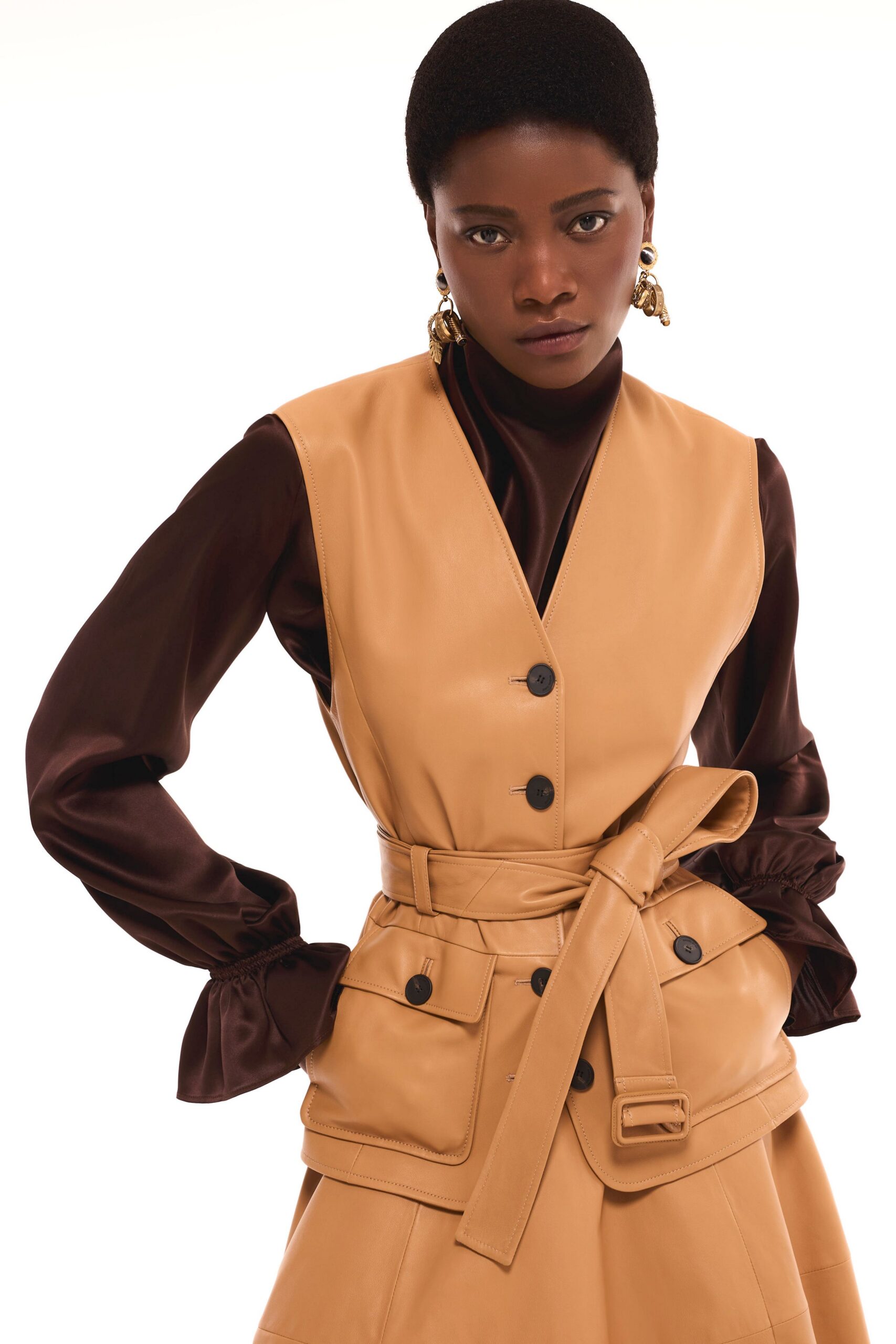 tan leather long-sleeve collared fitted belted buttoned vest