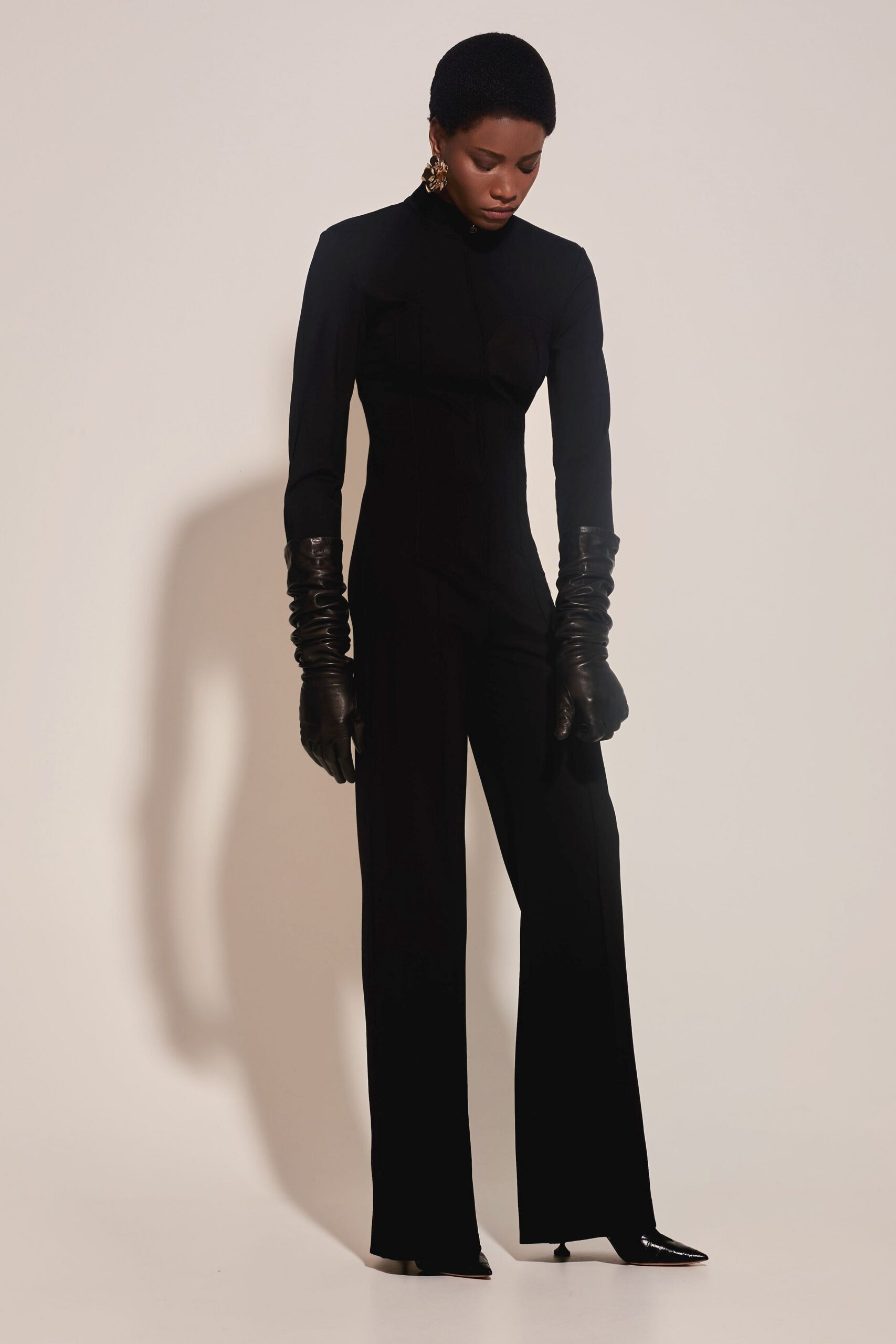 black cotton long-sleeve high-neck fitted straight-leg jumpsuit