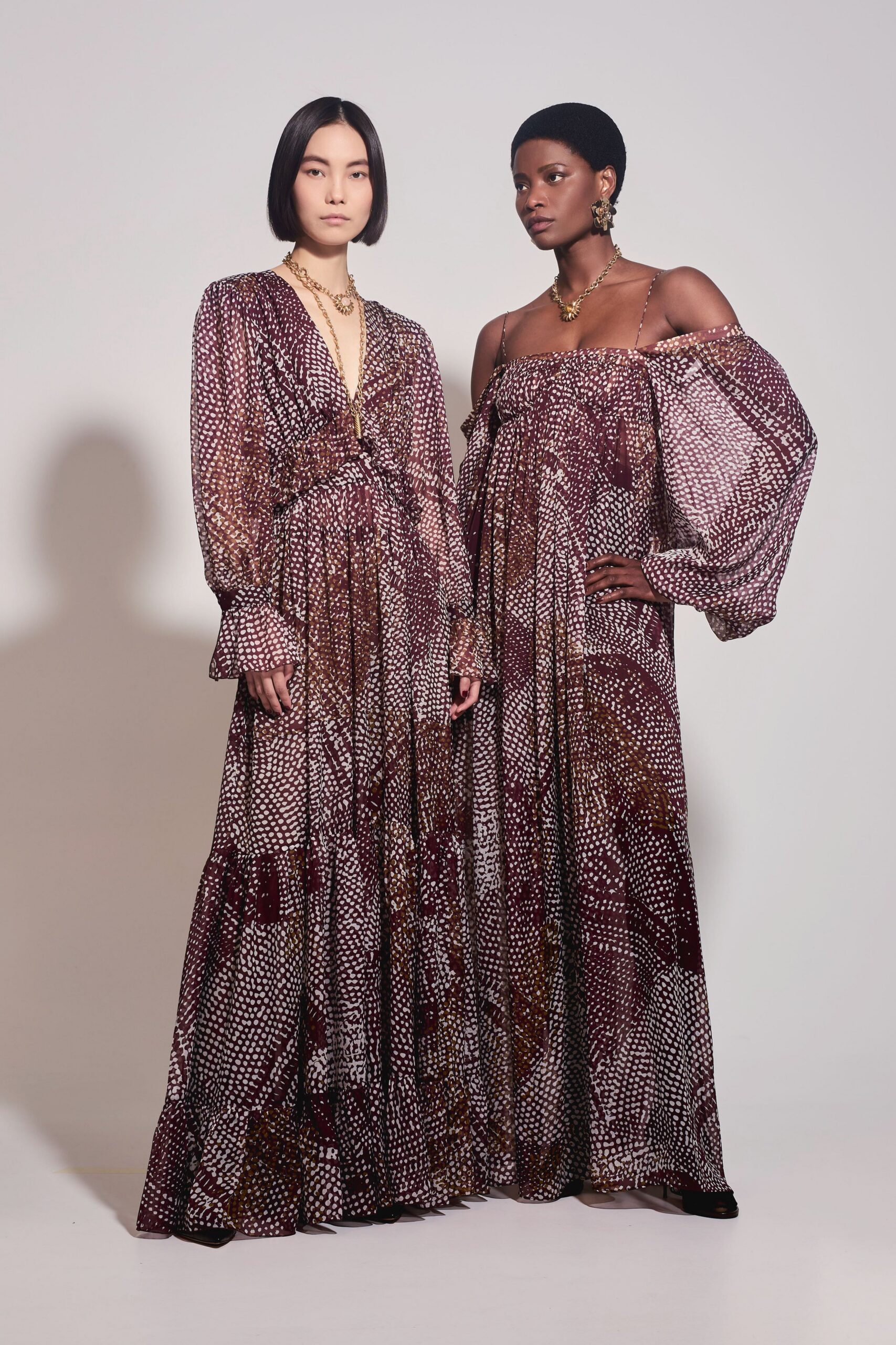 red silk long-sleeve v-neck fitted flared printed gown