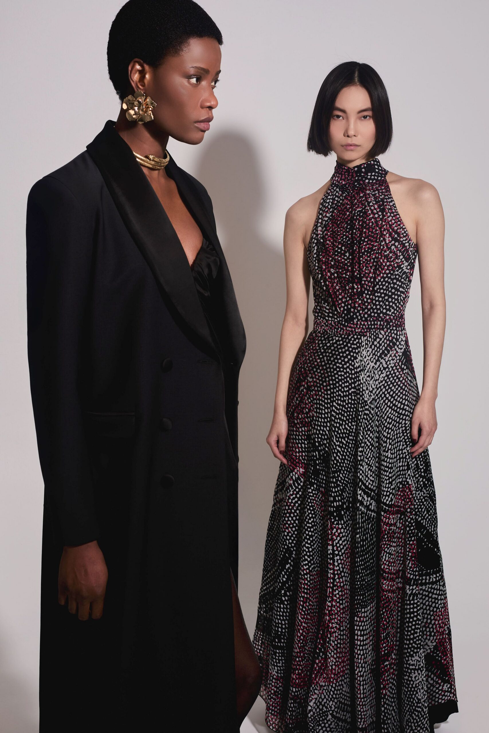 black tailored blazer and flared gown
