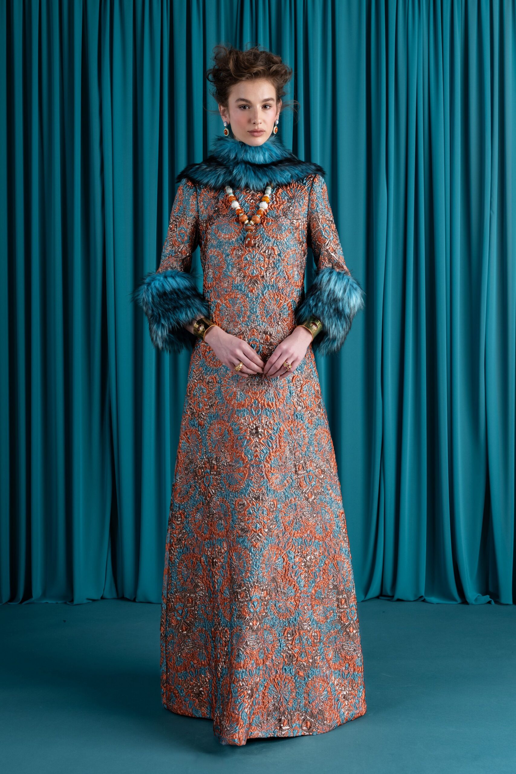 blue silk long-sleeve high-neck fitted floral layered gown