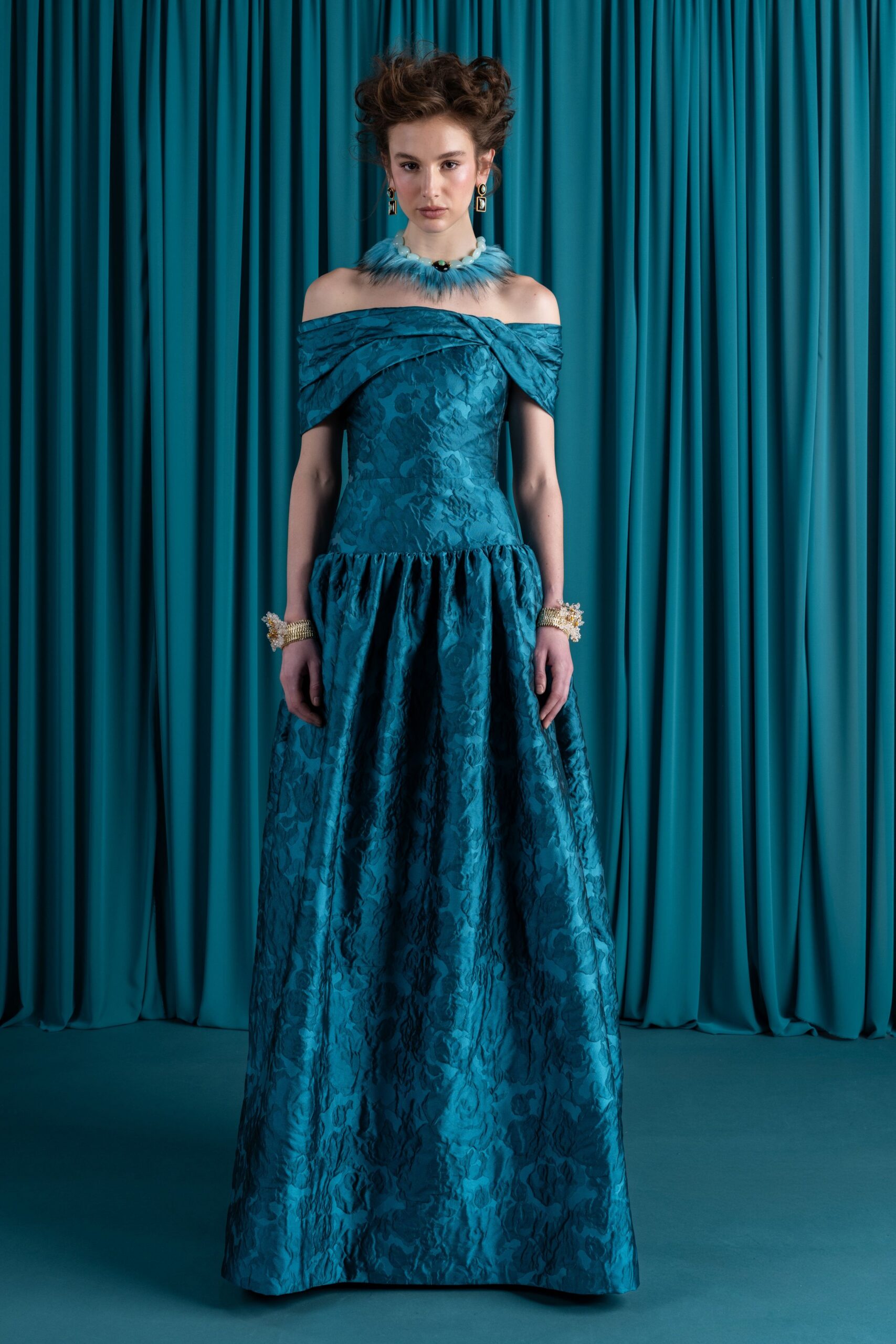 teal silk off-shoulder gown