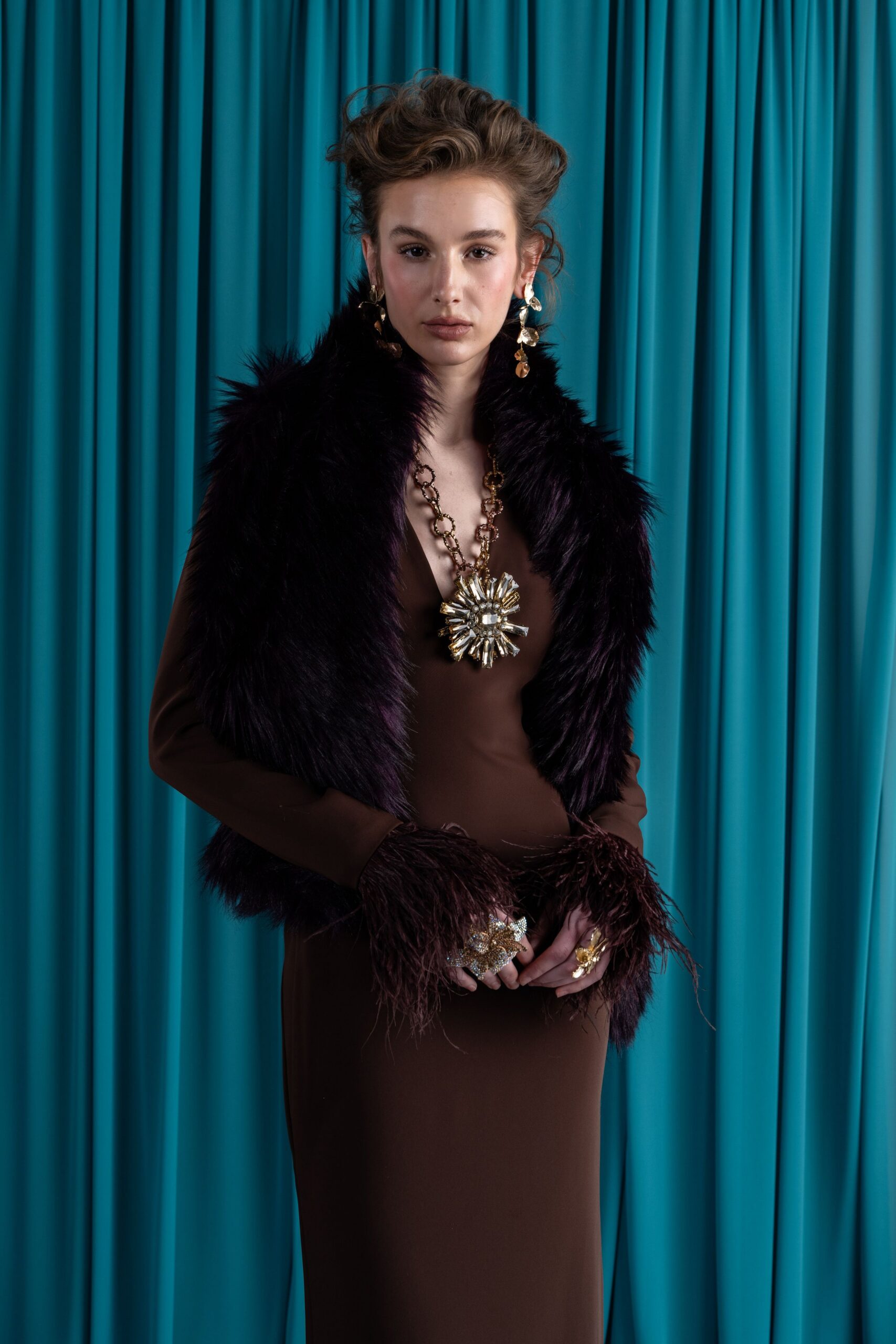 brown silk fitted gown with purple cape