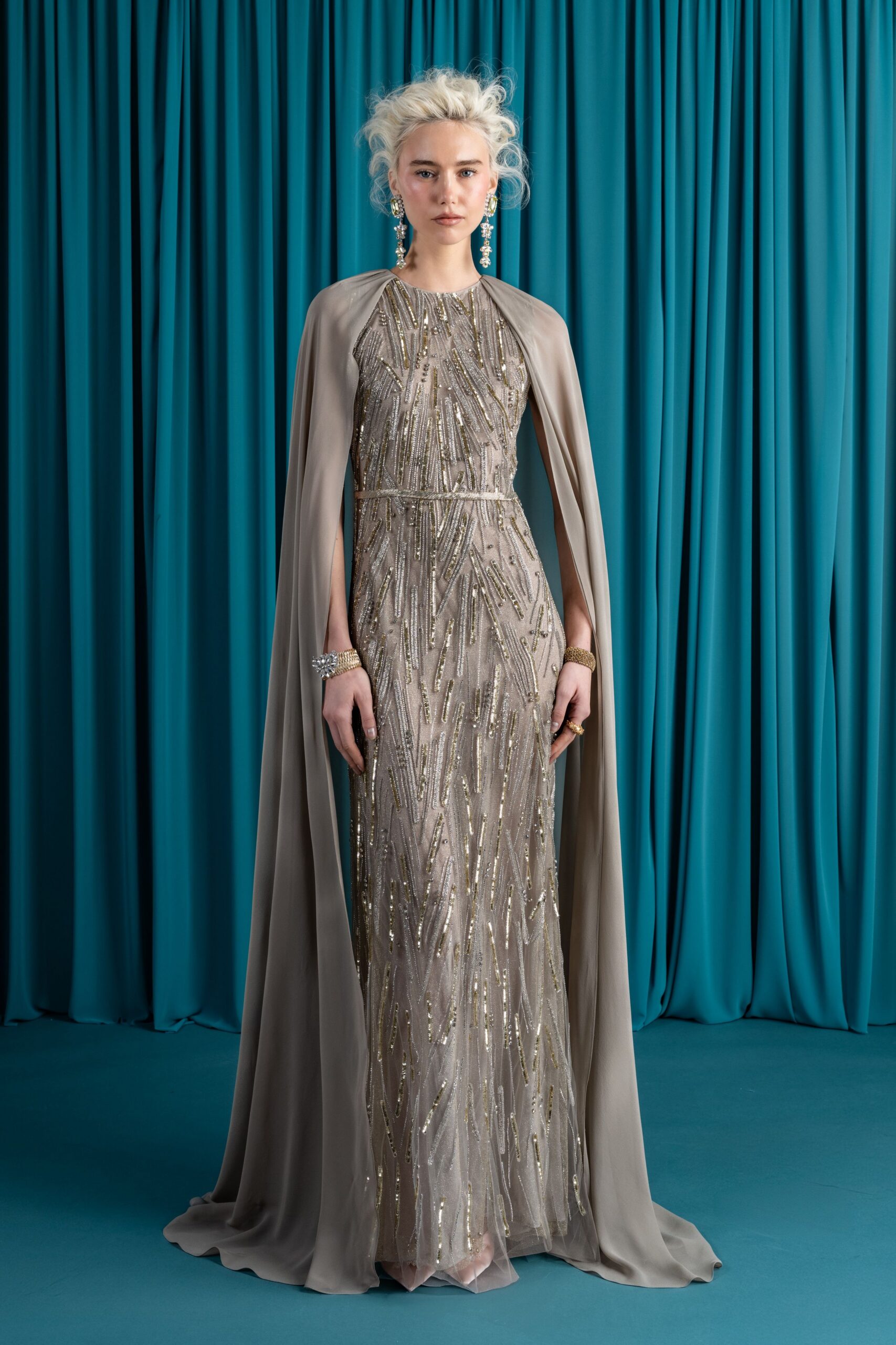 beige silk sleeveless high-neck fitted beaded layered gown