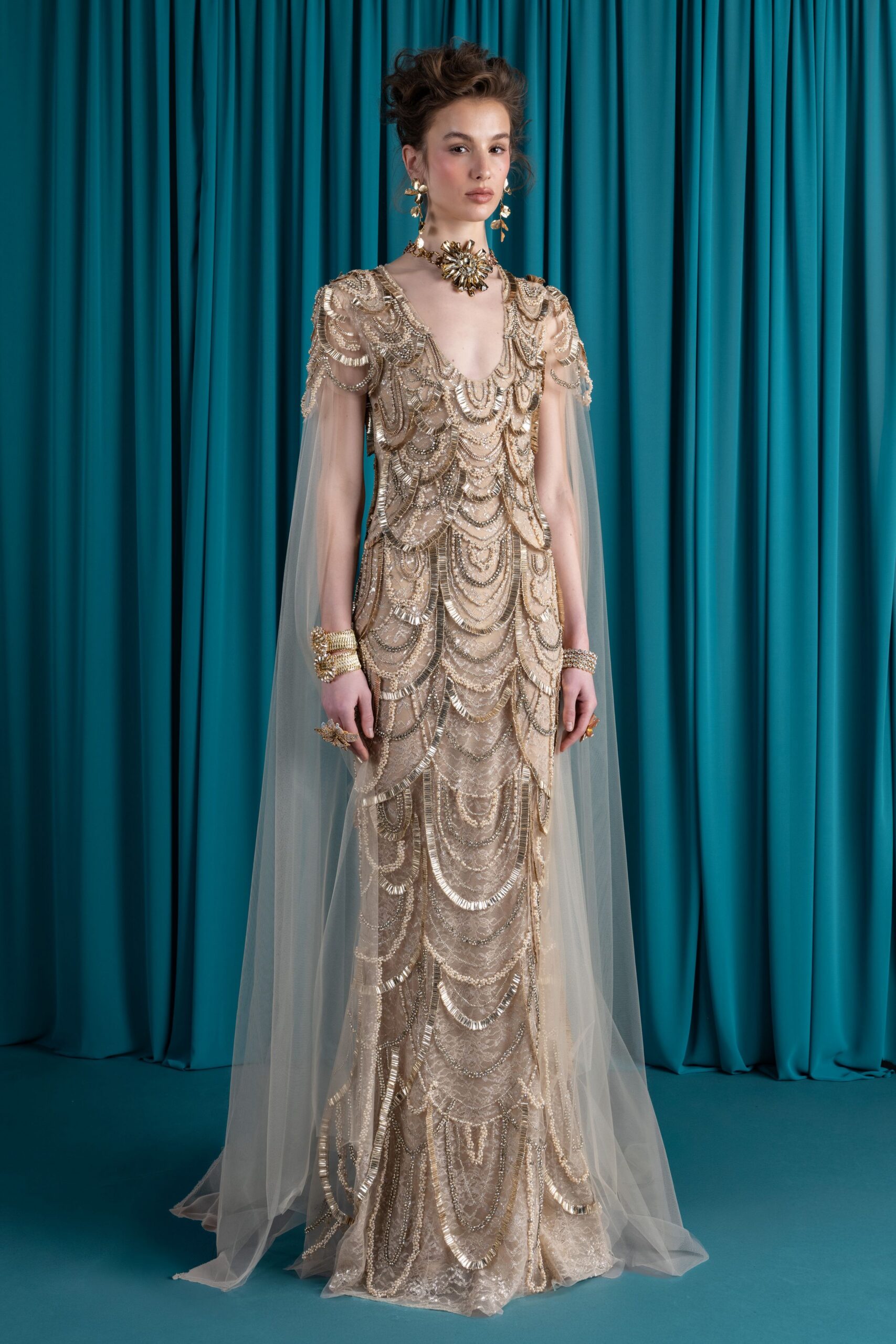 gold beaded sleeveless gown