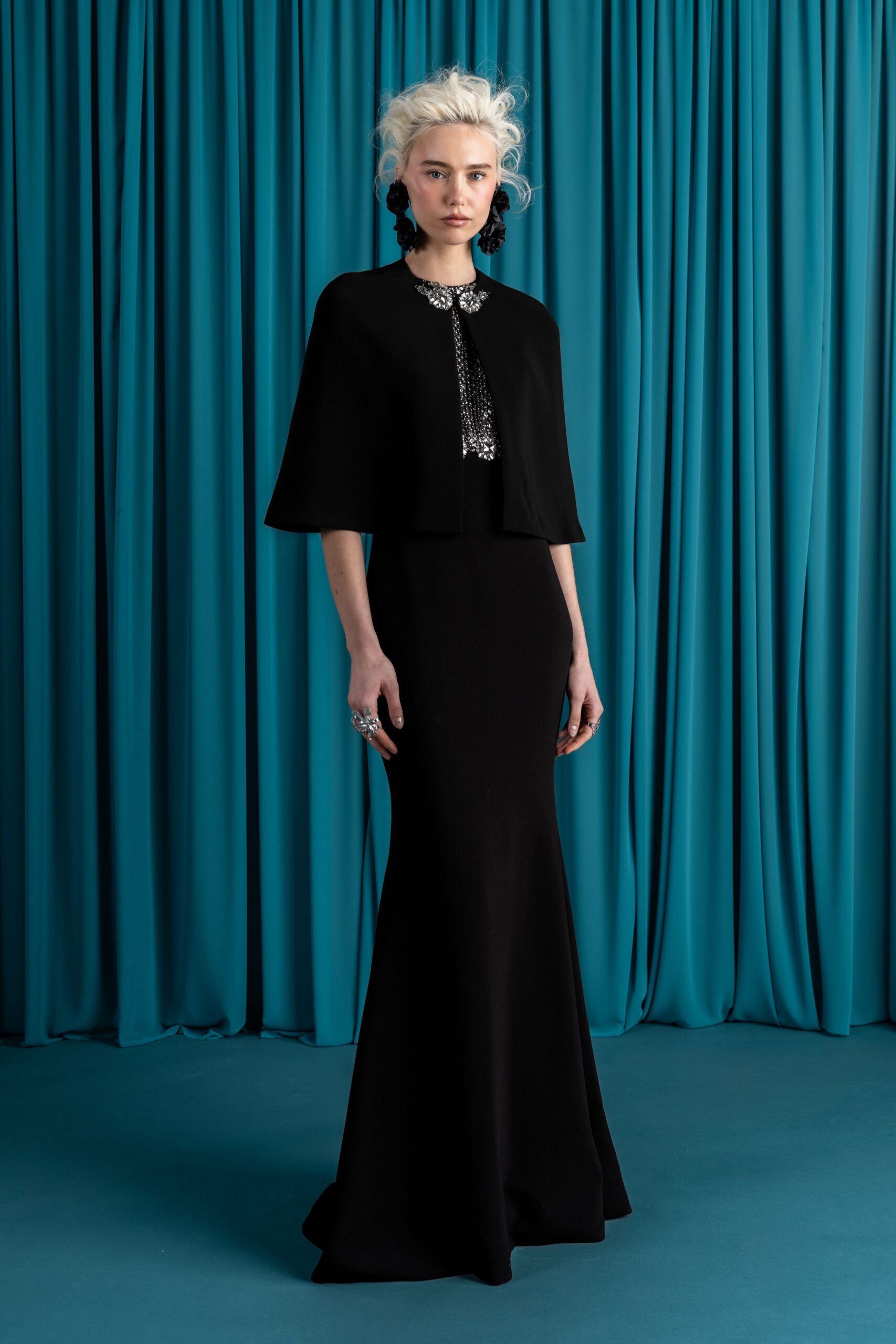 black wool long-sleeve high-neck fitted flared maxi gown