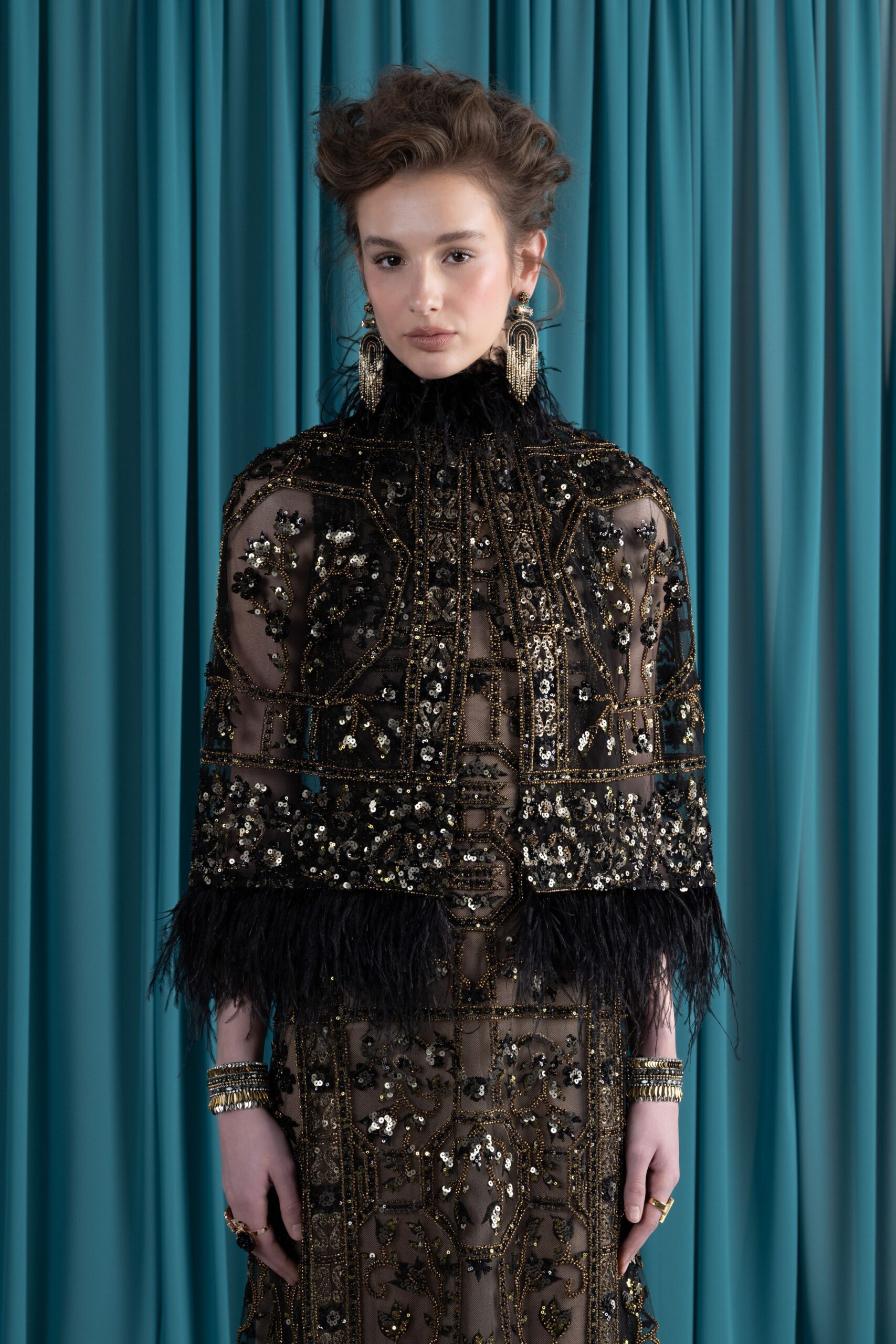 black embroidered cape and gown