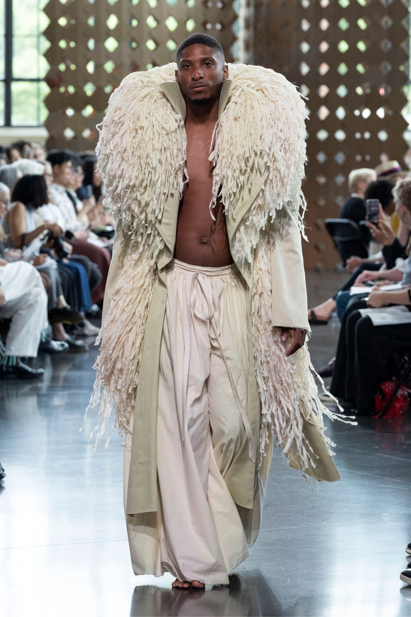 beige fur coat with white pants