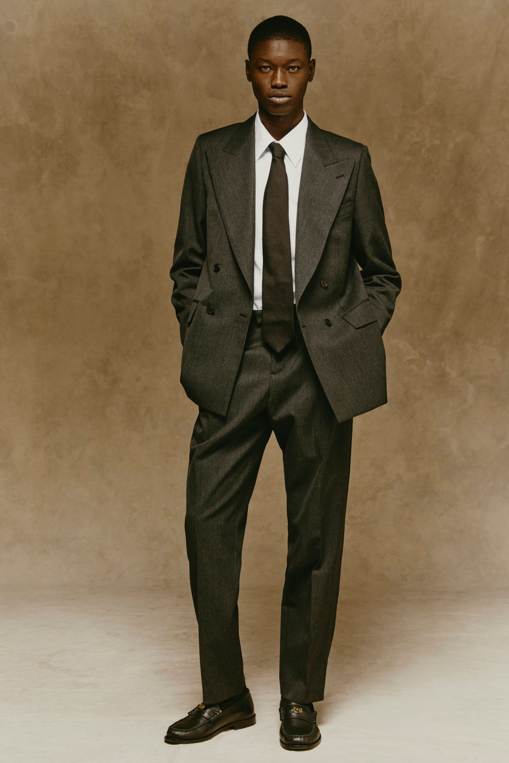 gray tailored suit with white shirt
