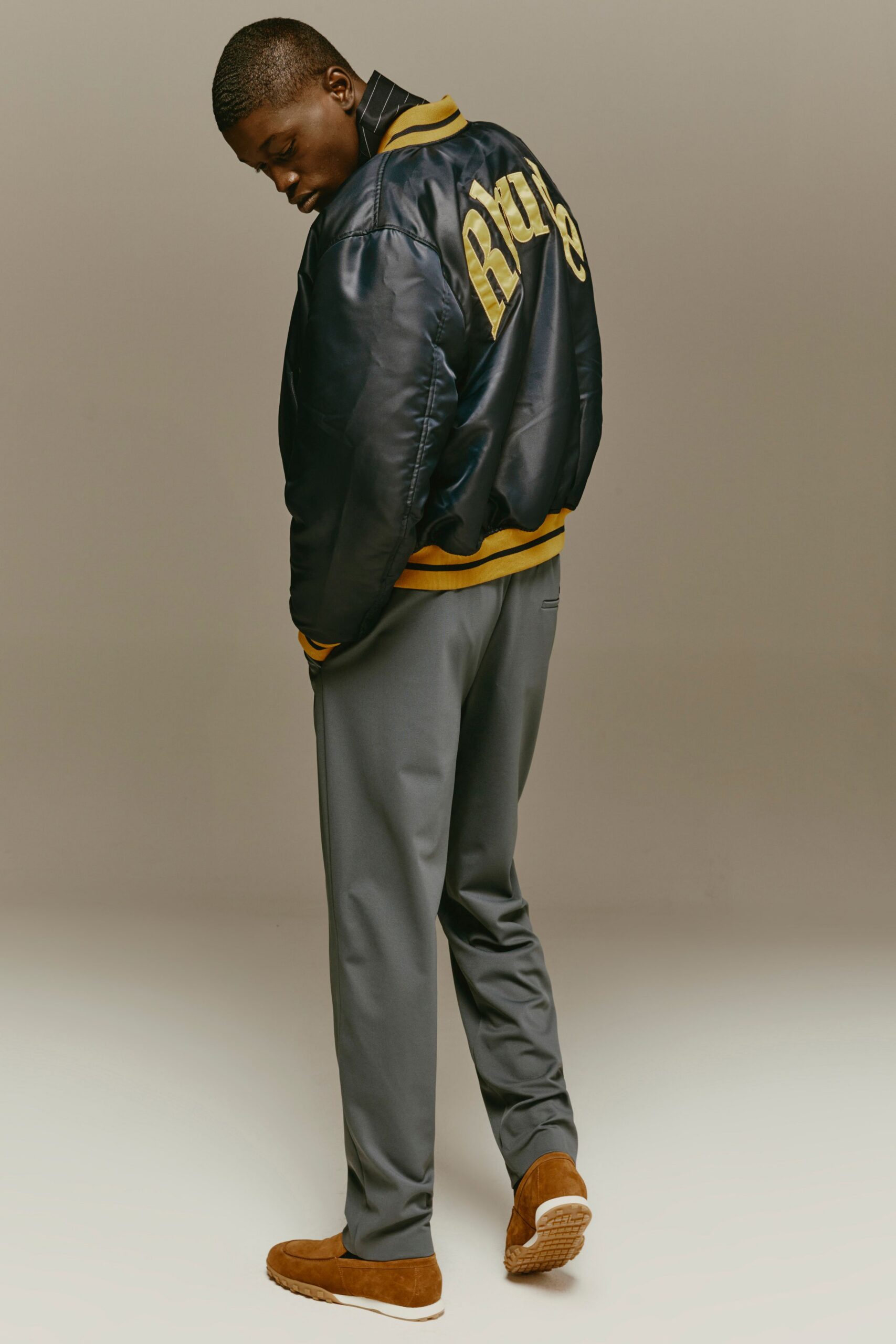 black satin jacket gray pants brown shoes