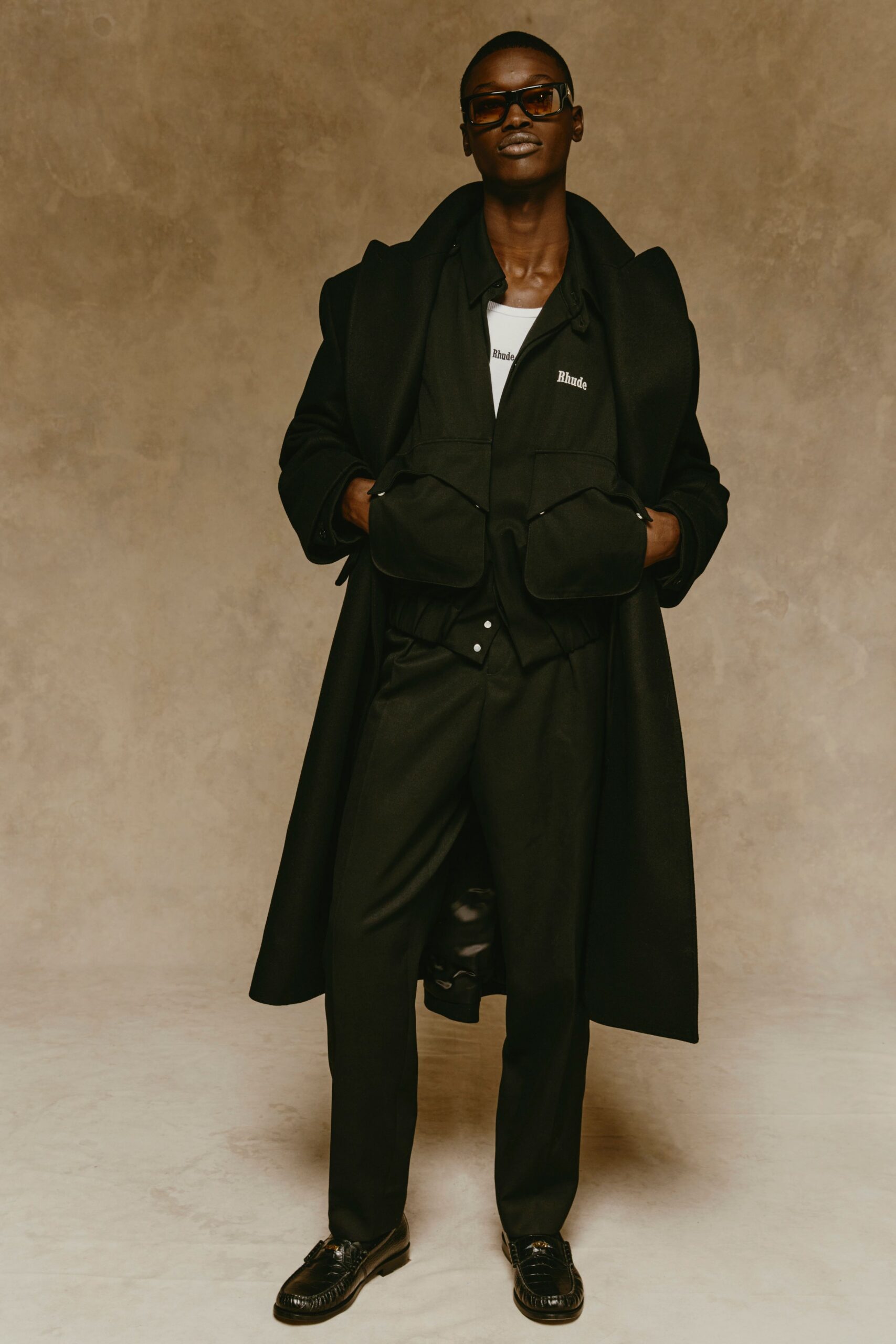 black wool coat with tailored pants
