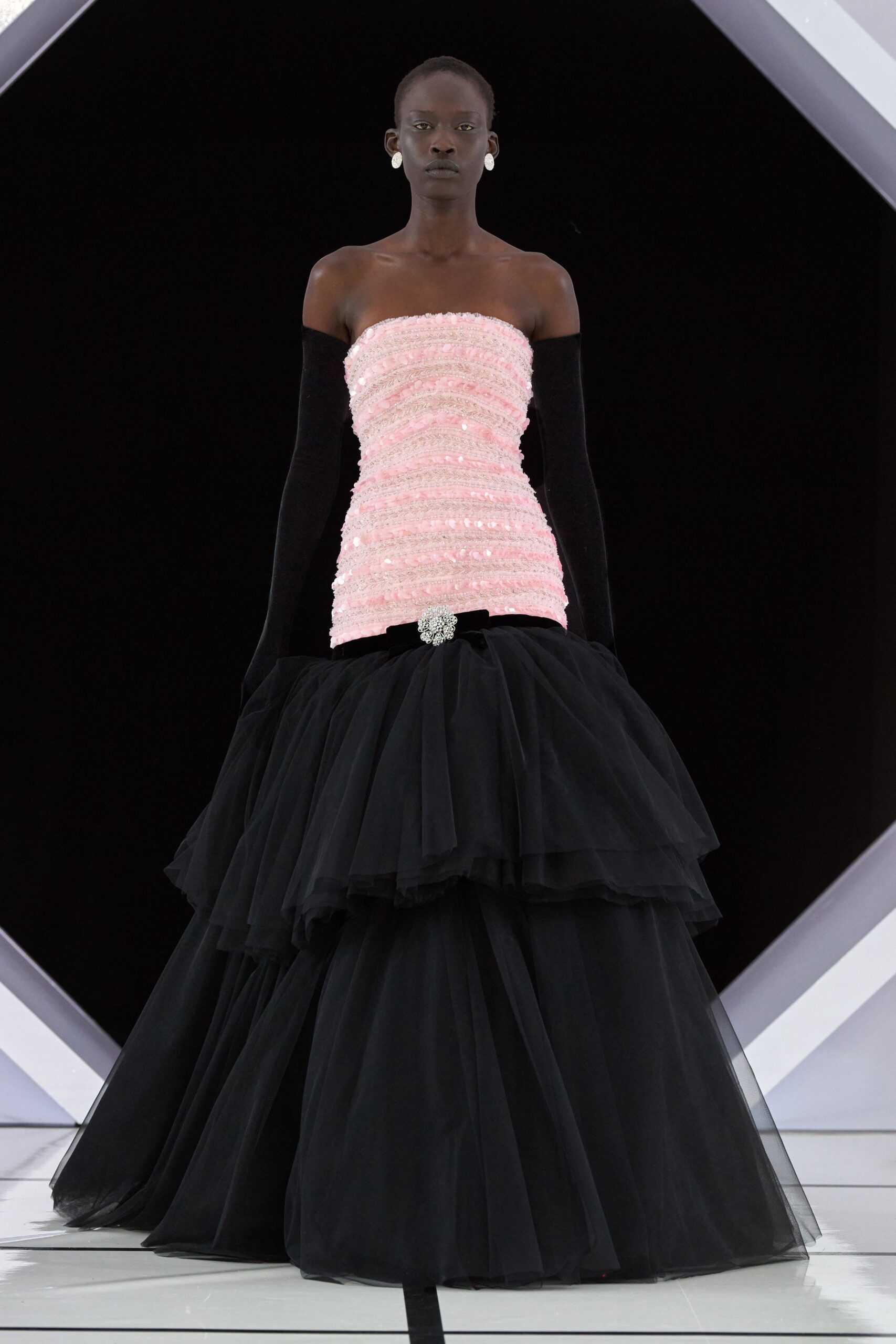 pink tulle strapless fitted ruffled beaded flowing gown