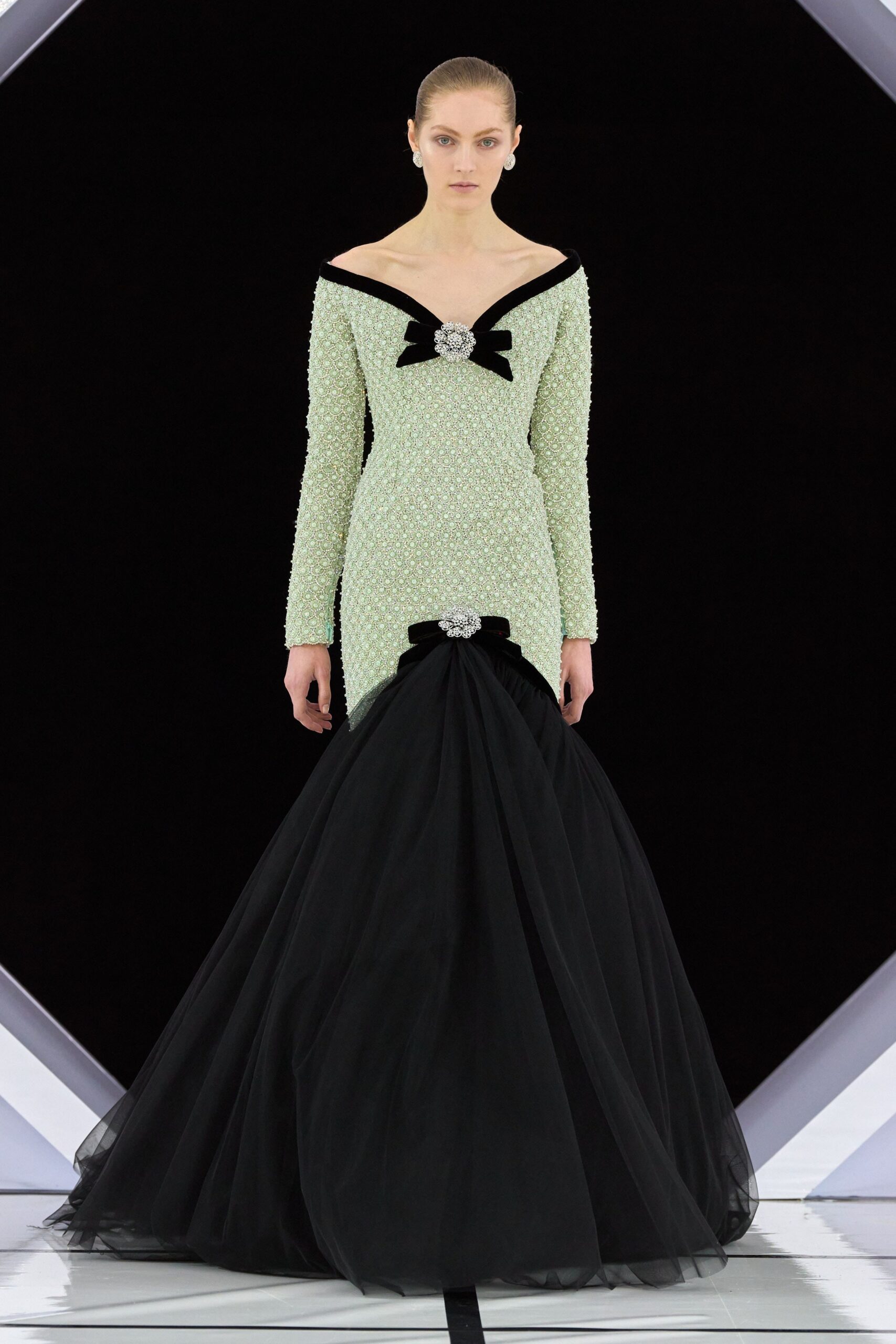 green embroidered off-shoulder gown
