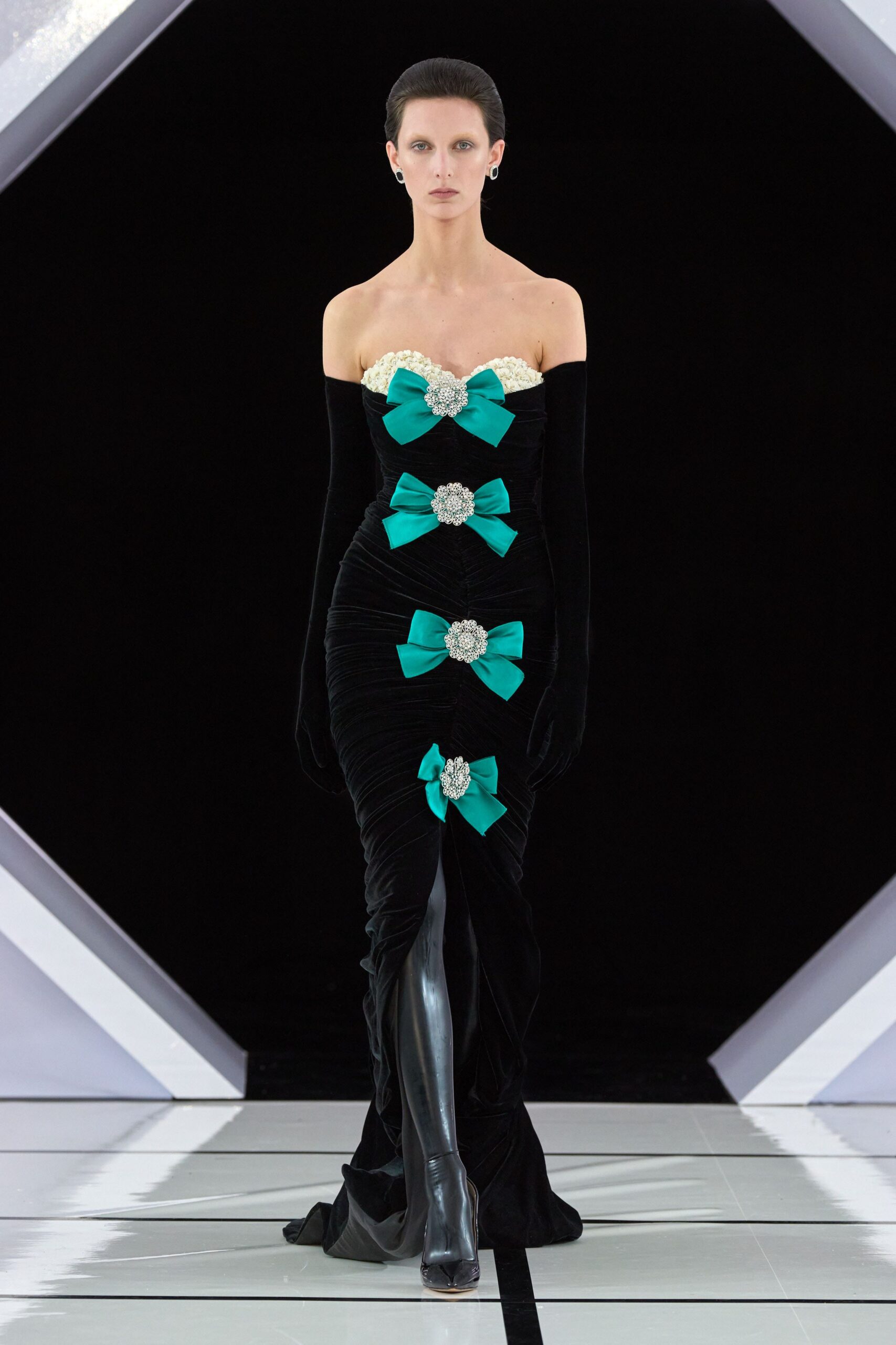 black silk strapless gown with teal bows