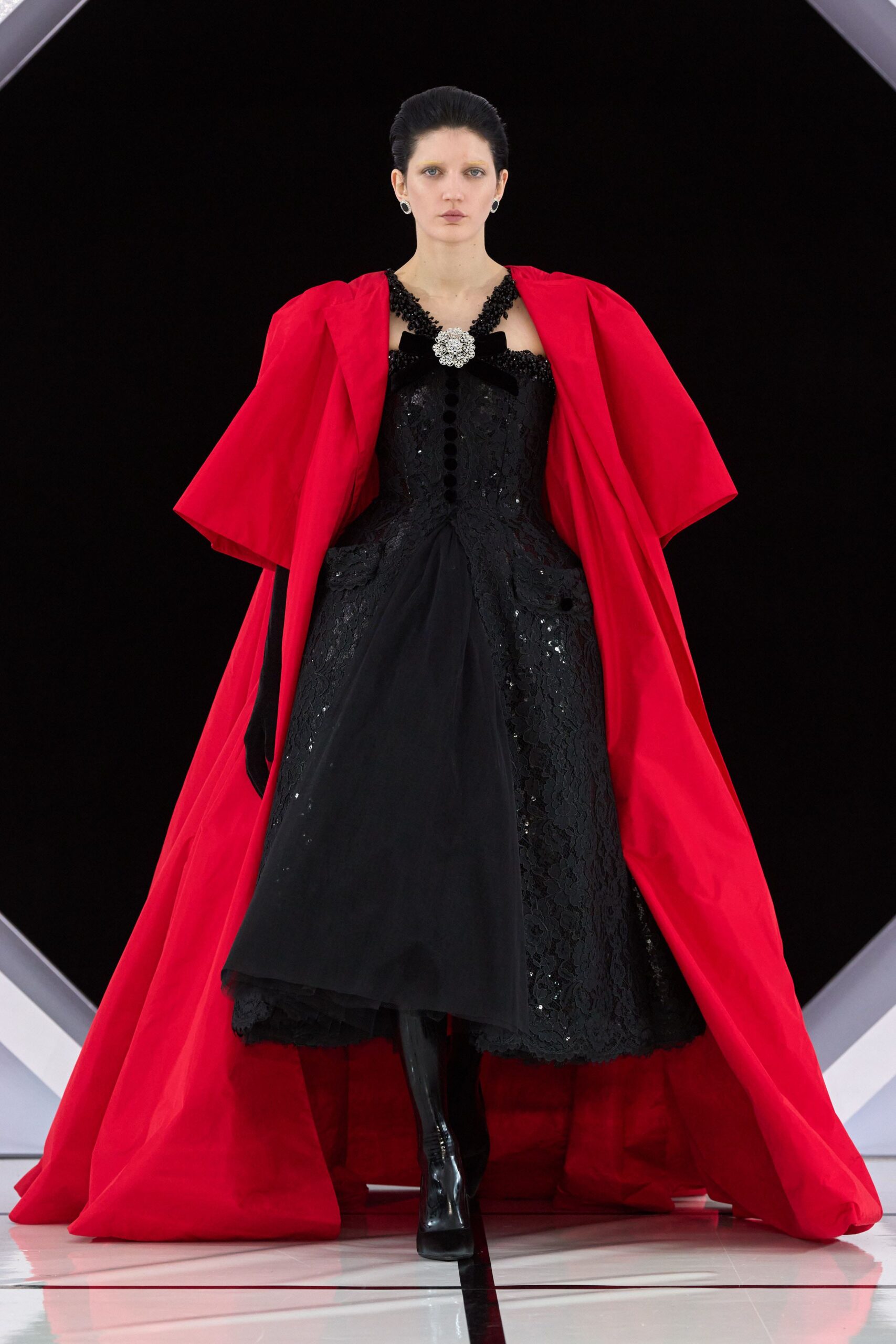 red silk oversized draped cape