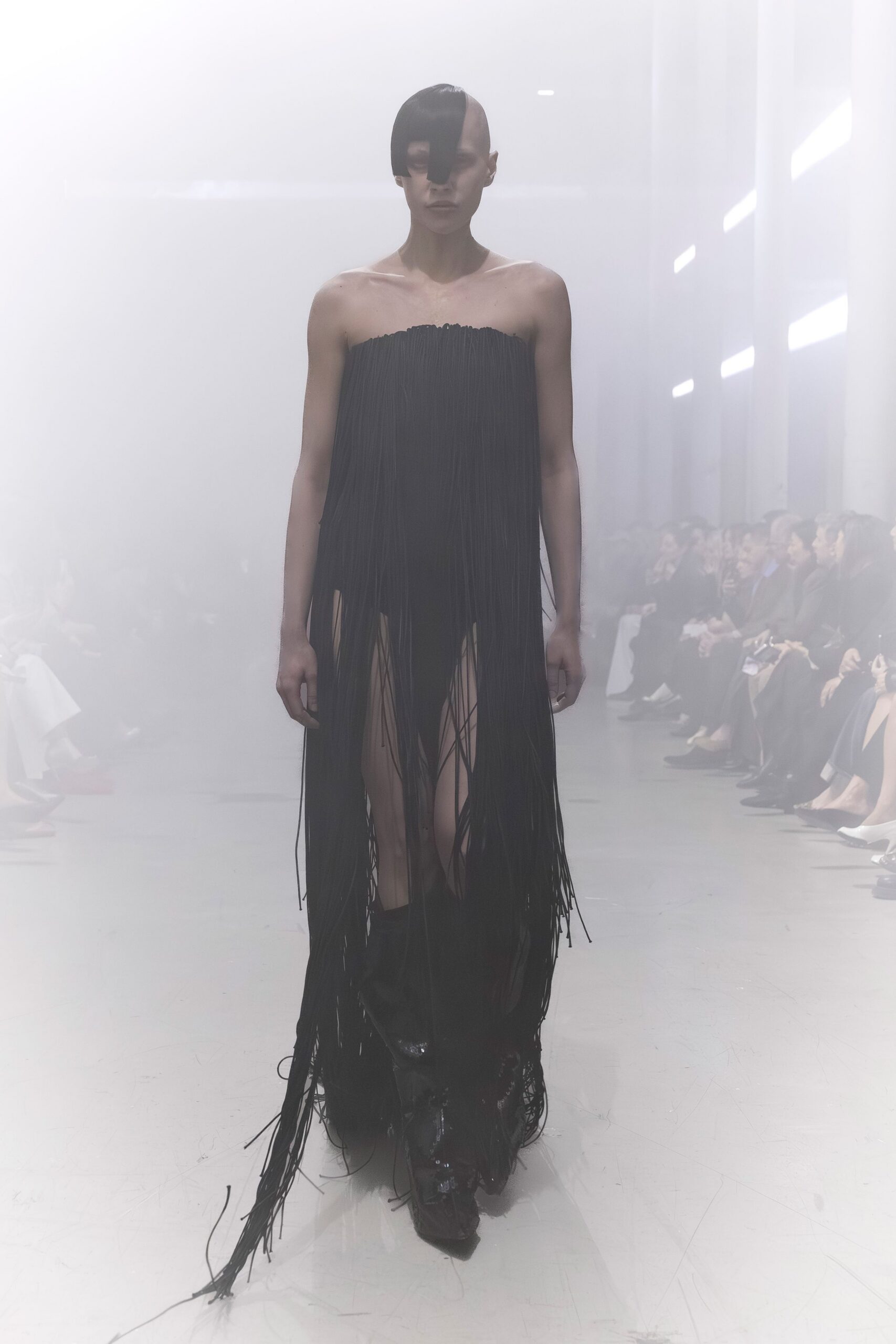 black fringed maxi dress with boots