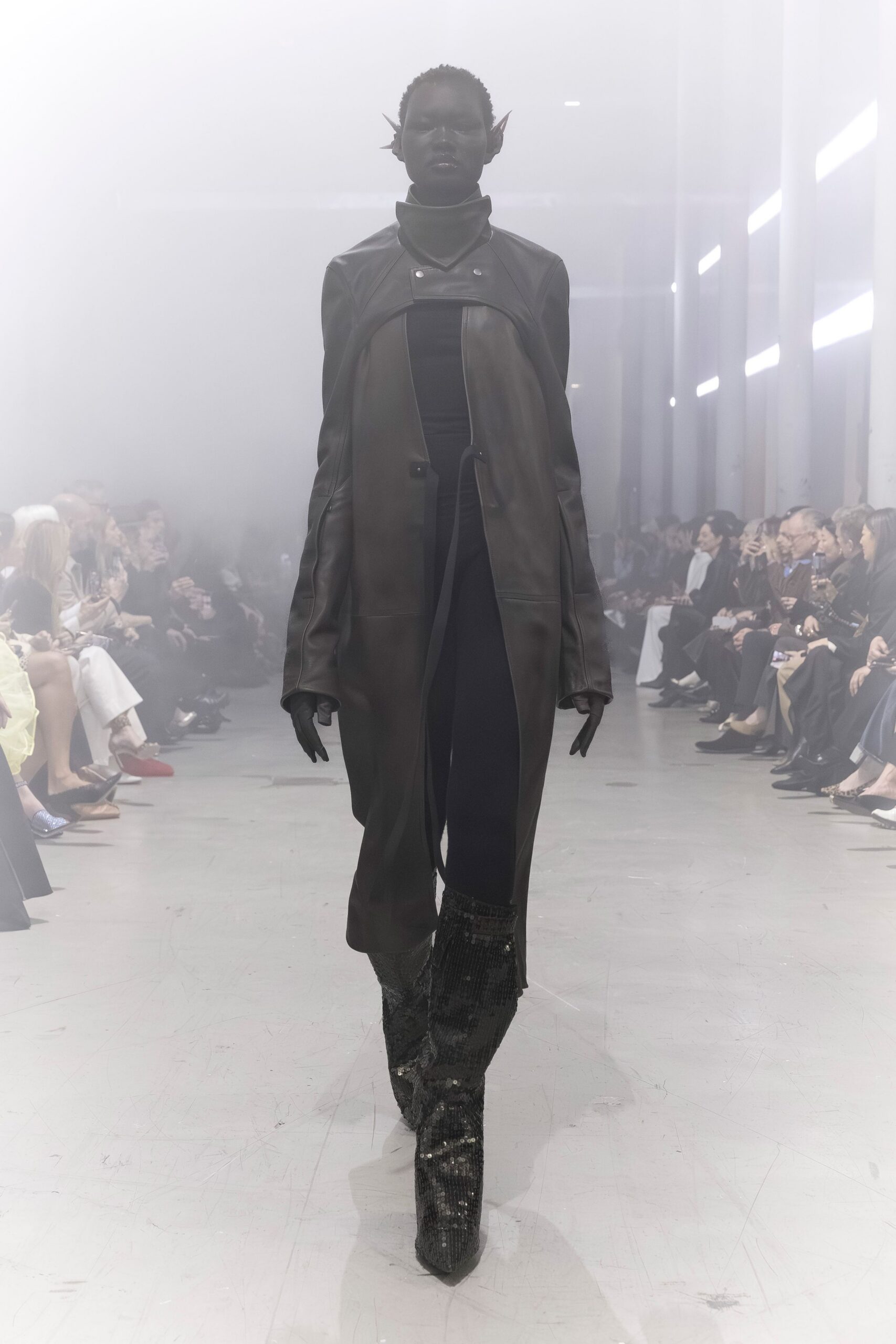 black leather coat and fitted outfit