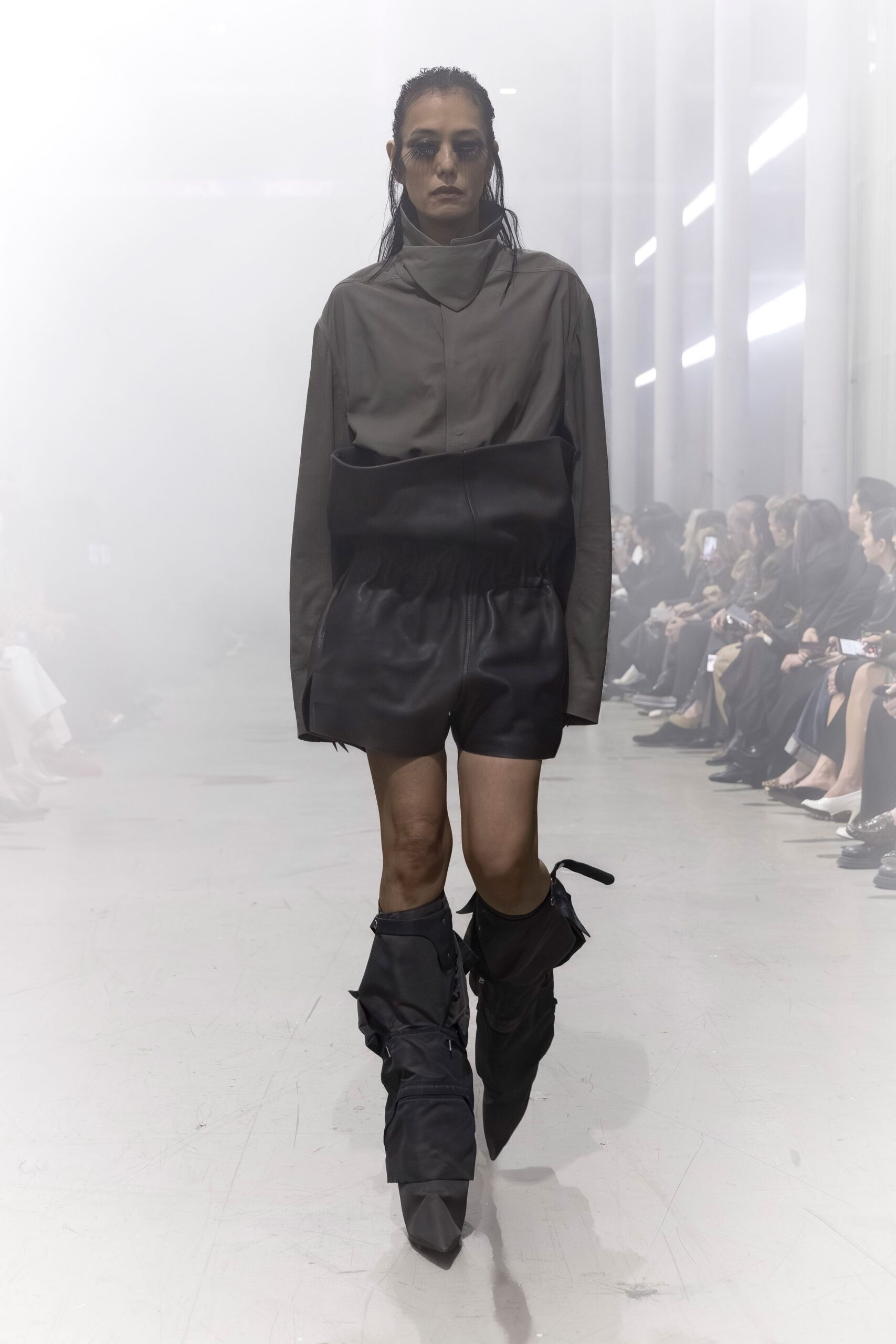 gray oversized top black fitted shorts
