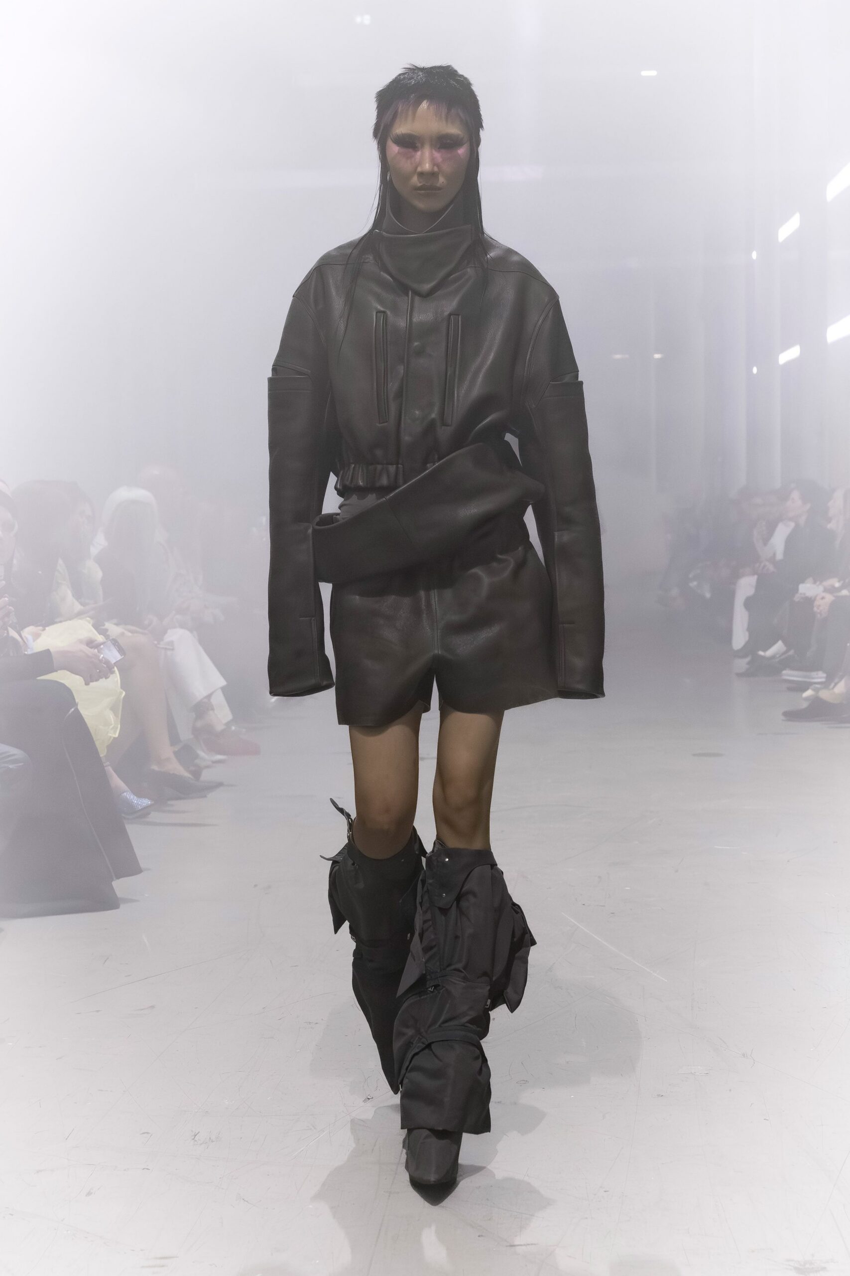 black leather fitted jacket and shorts