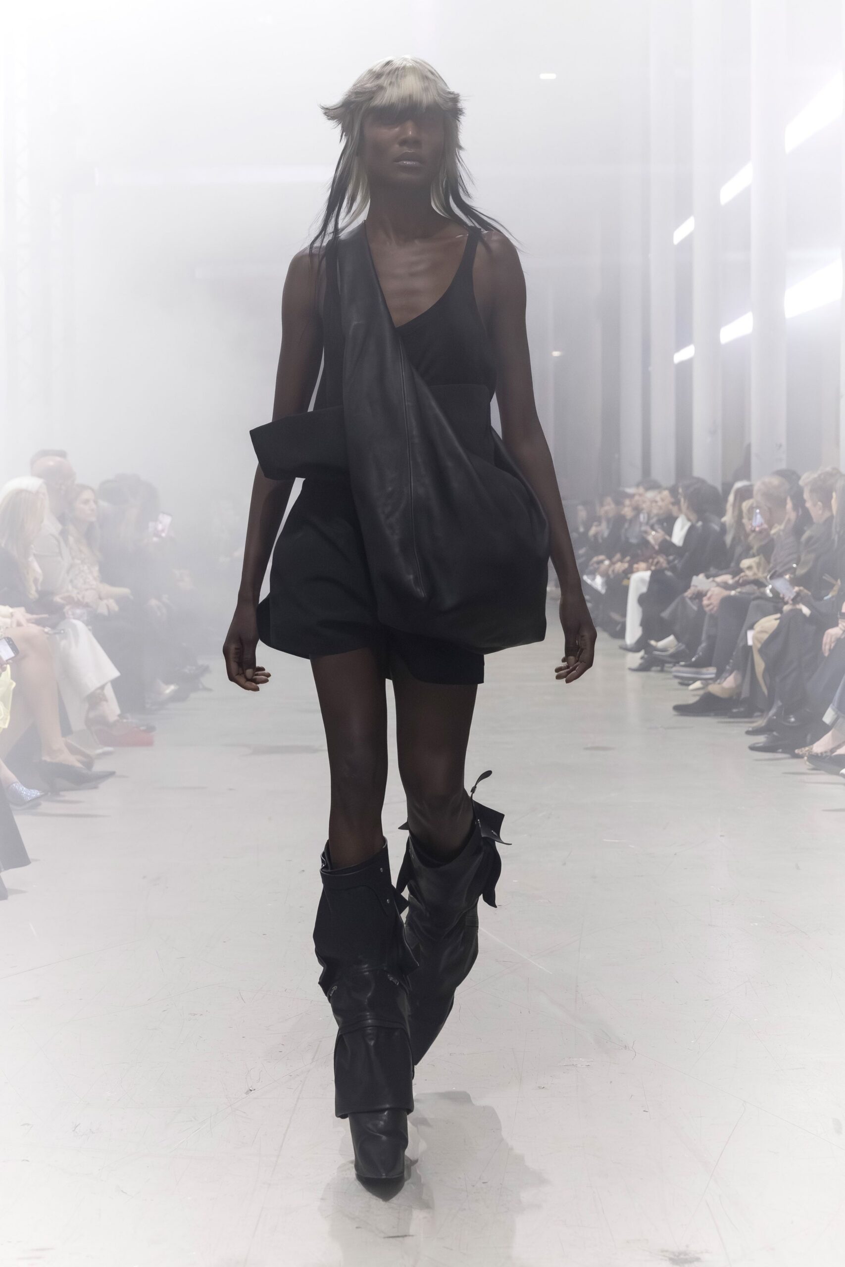 black leather mini dress and boots