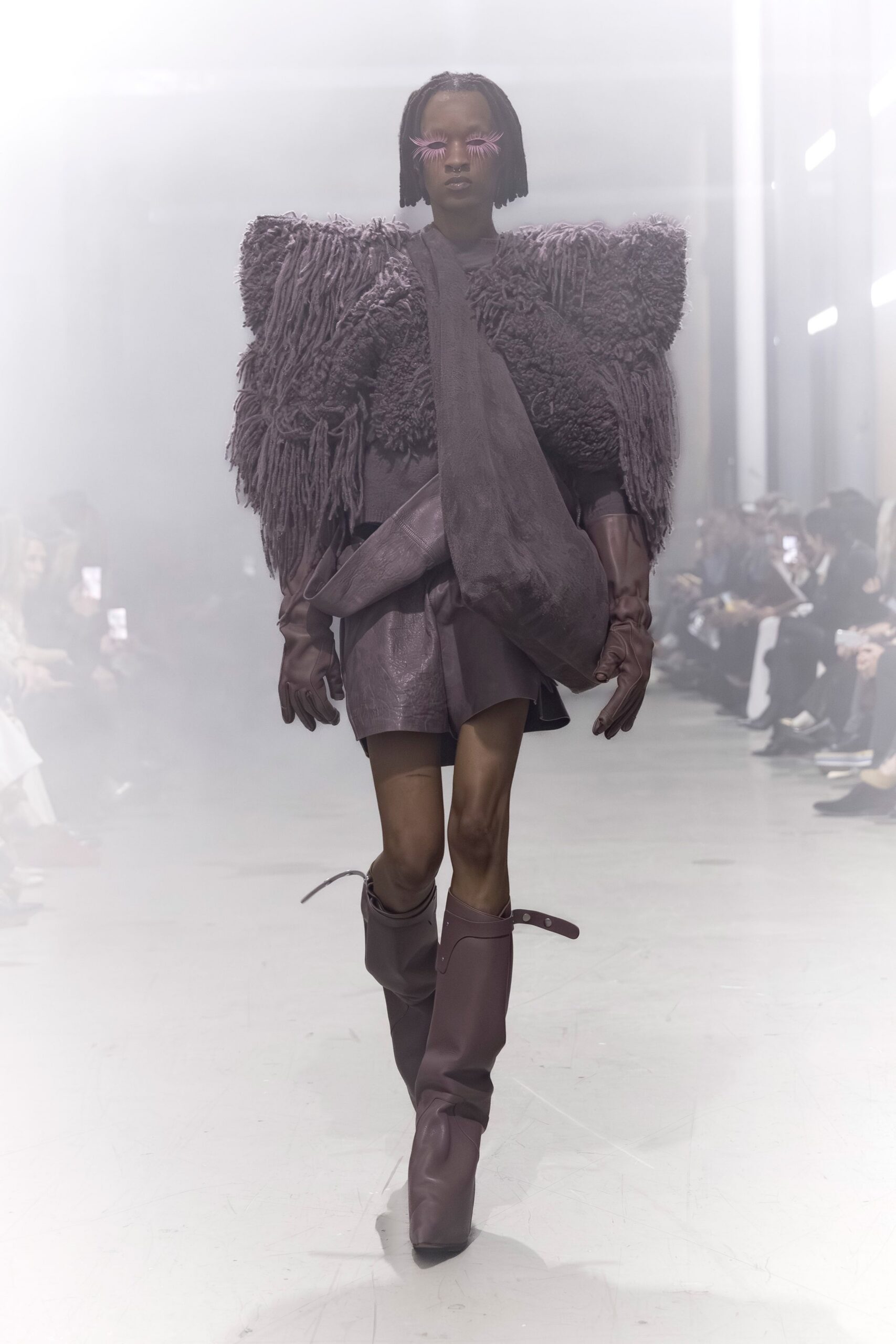 purple ruffled mini dress with brown boots