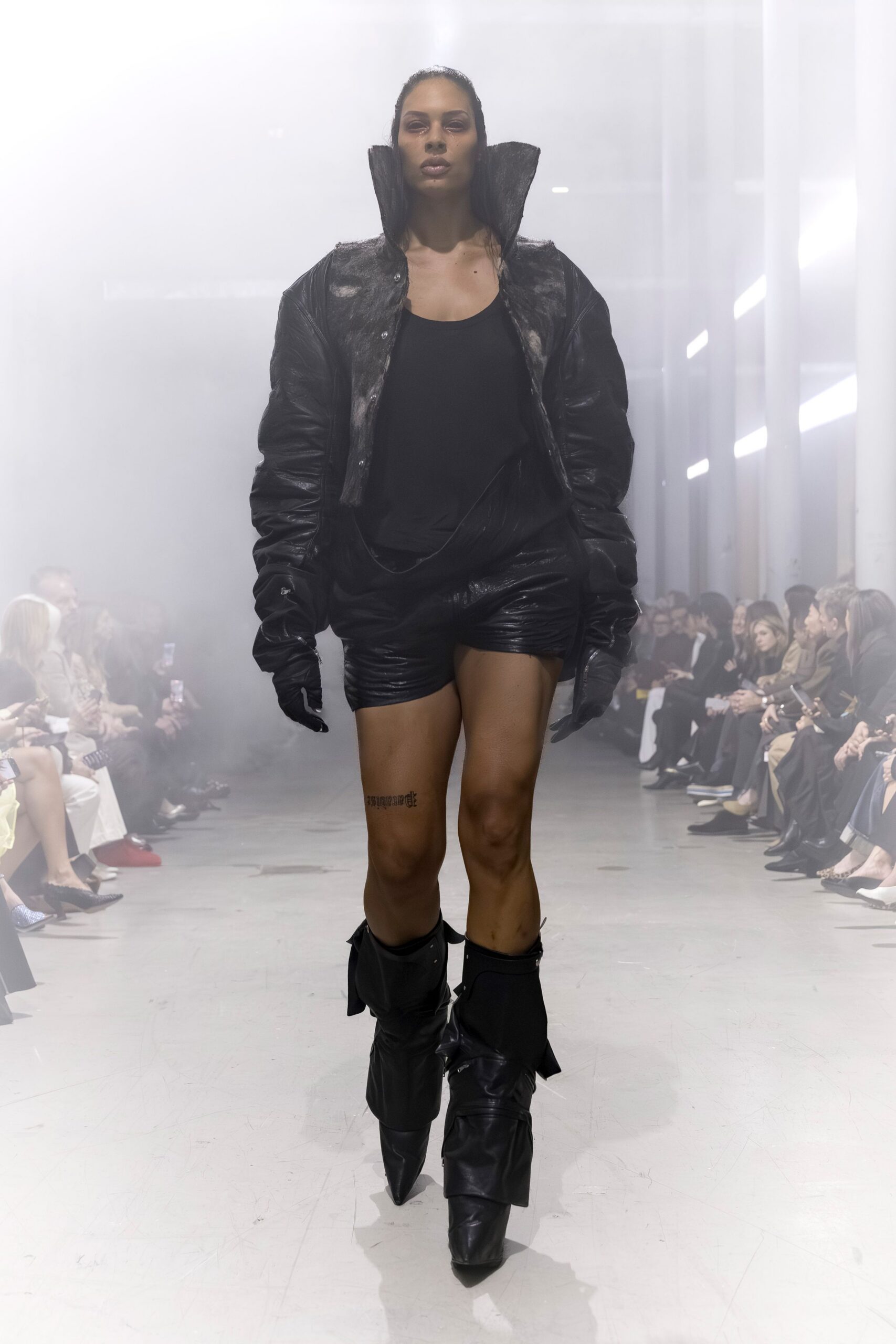 black leather oversized jacket and fitted top