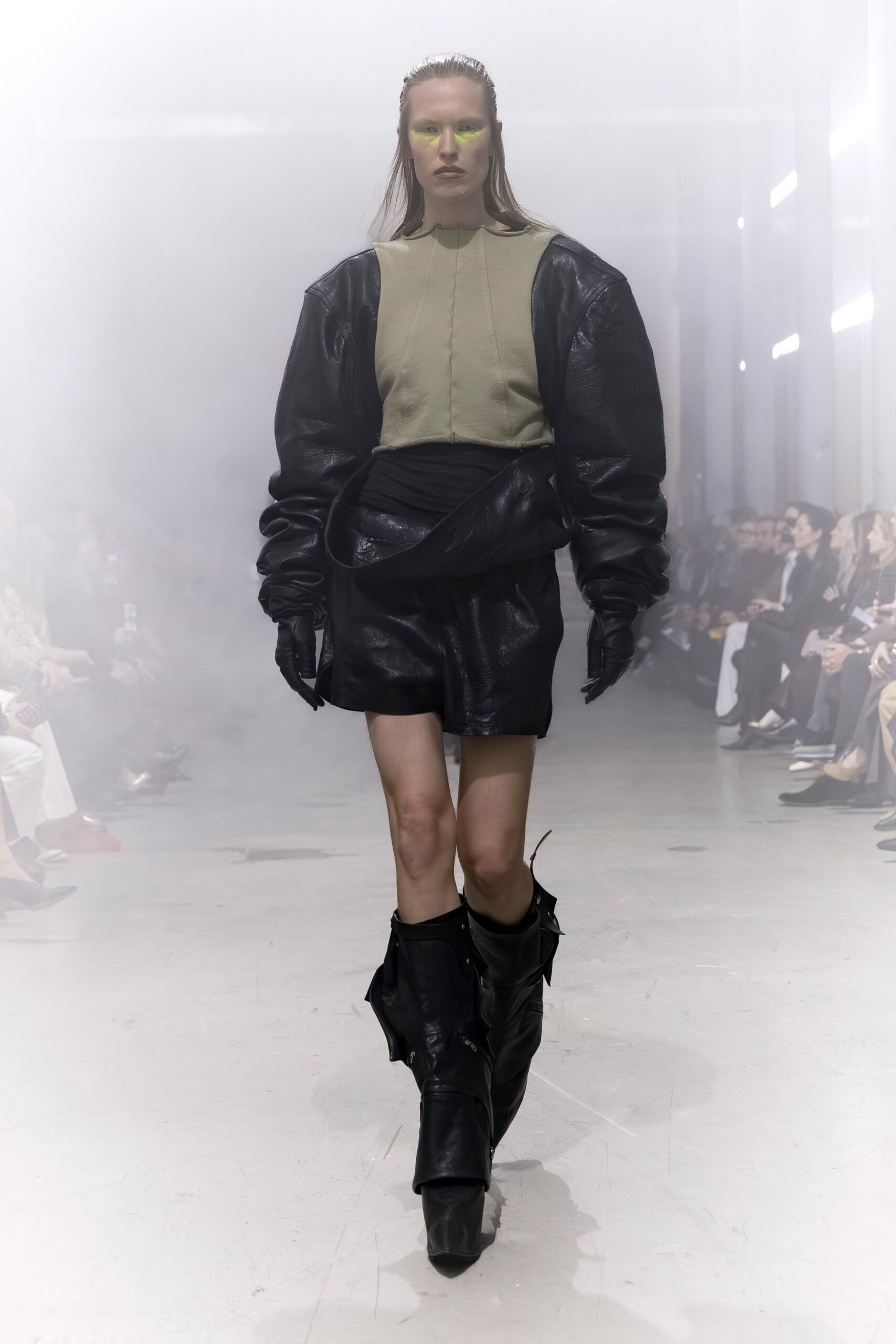 beige fitted top black leather skirt