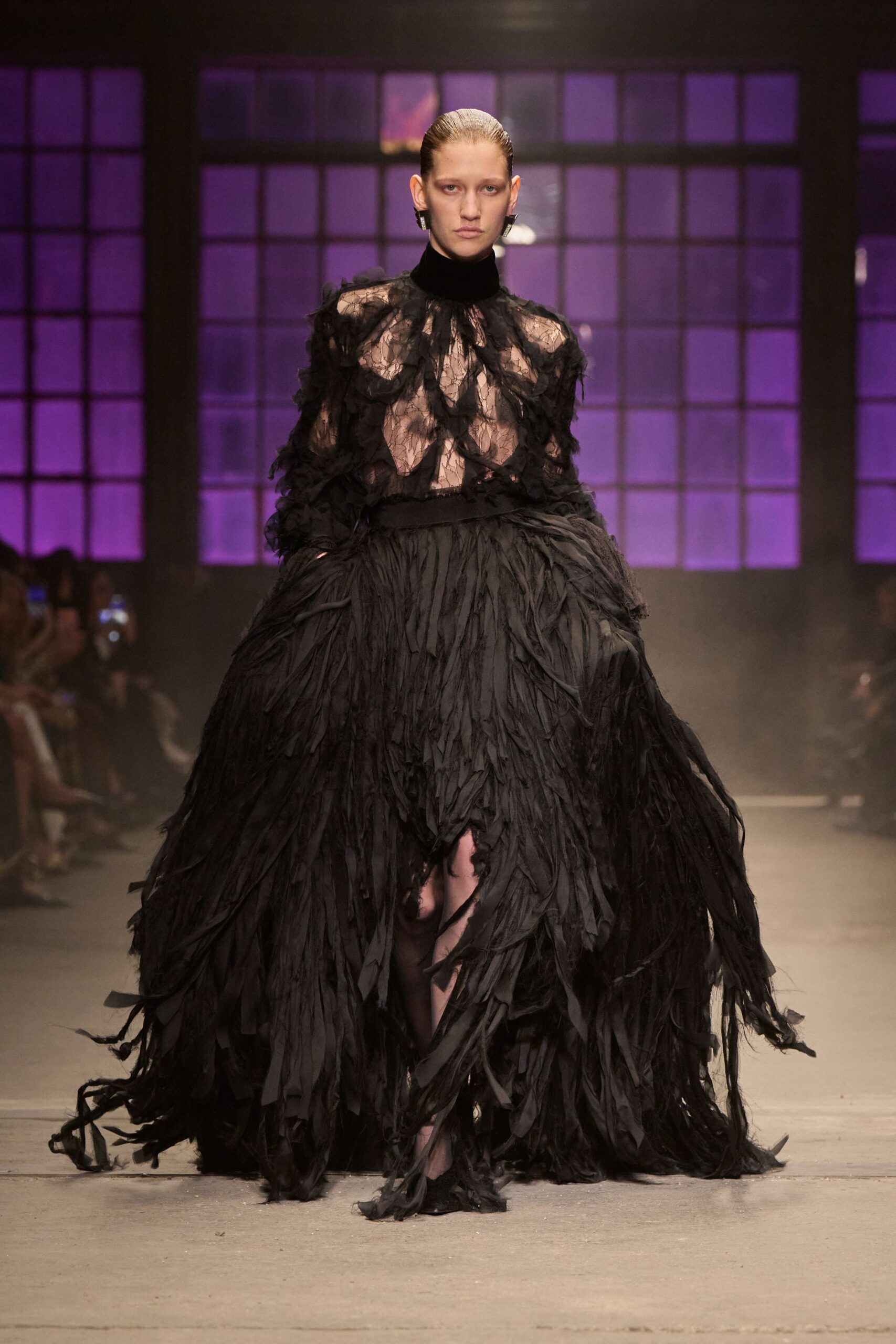 black fringed long-sleeve gown