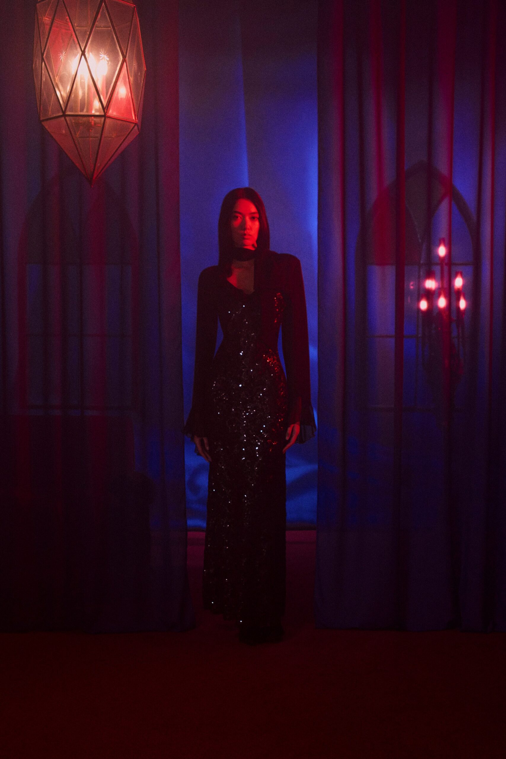 black sequined long-sleeve gown