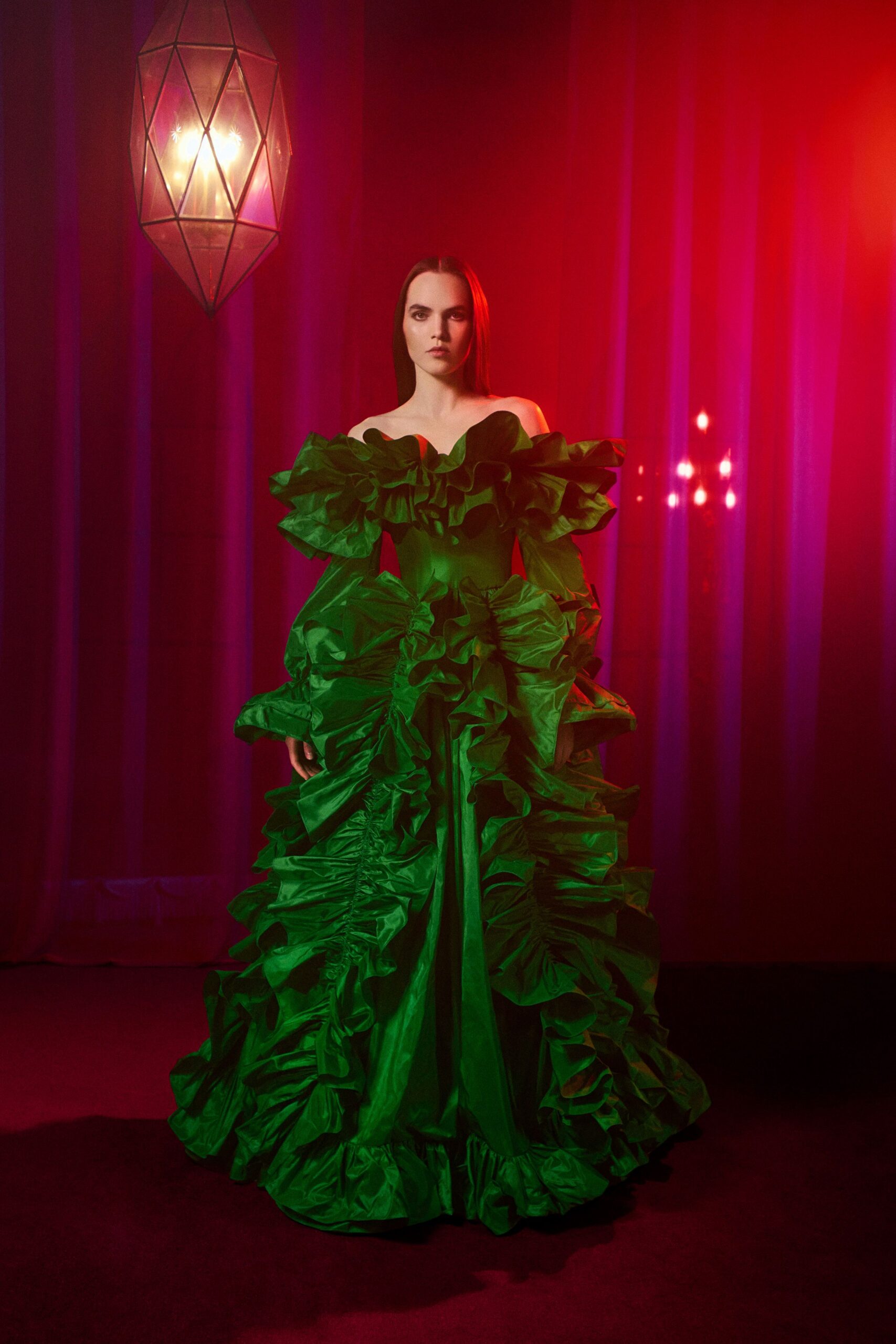 green ruffled strapless gown