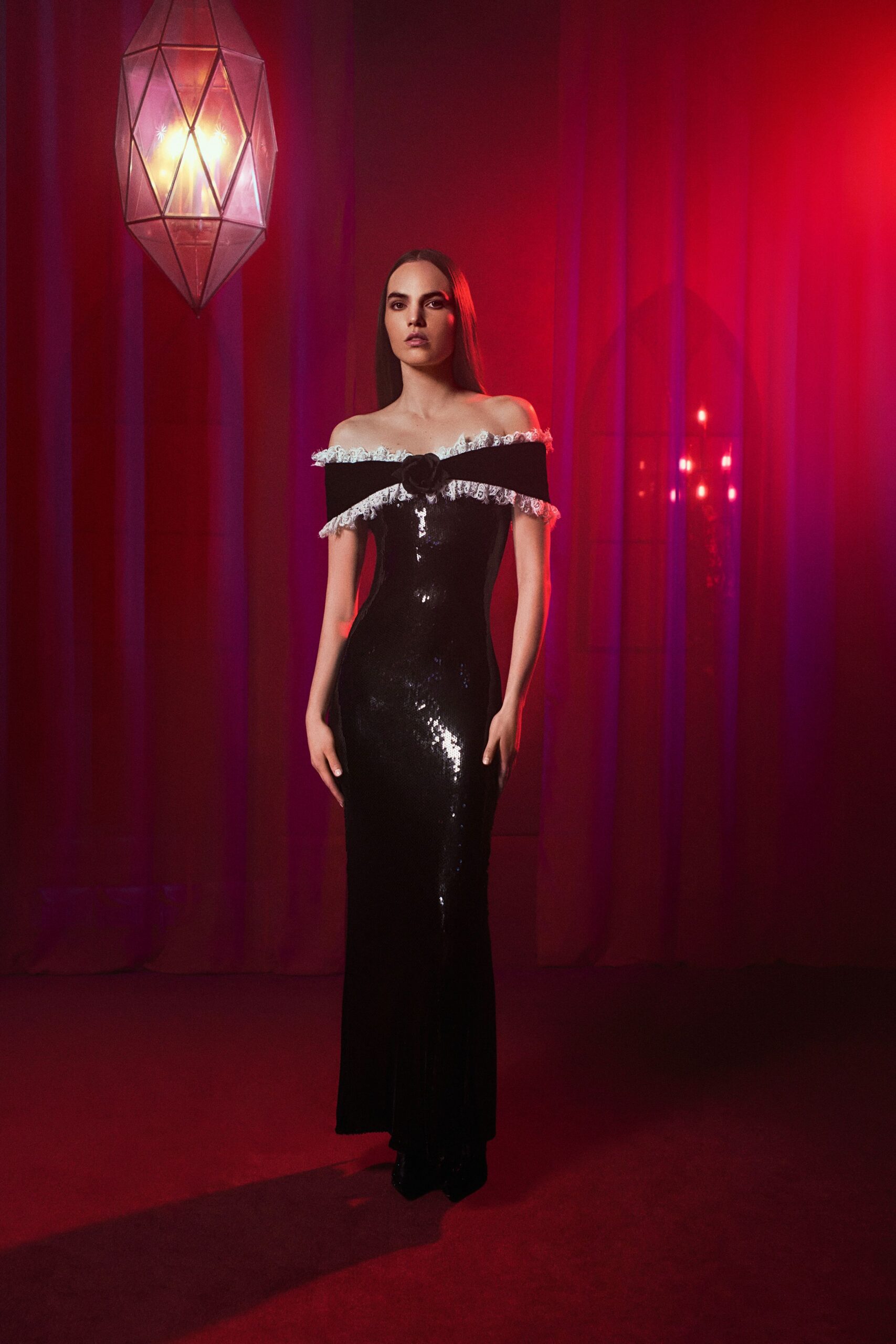 black sequin off-shoulder gown