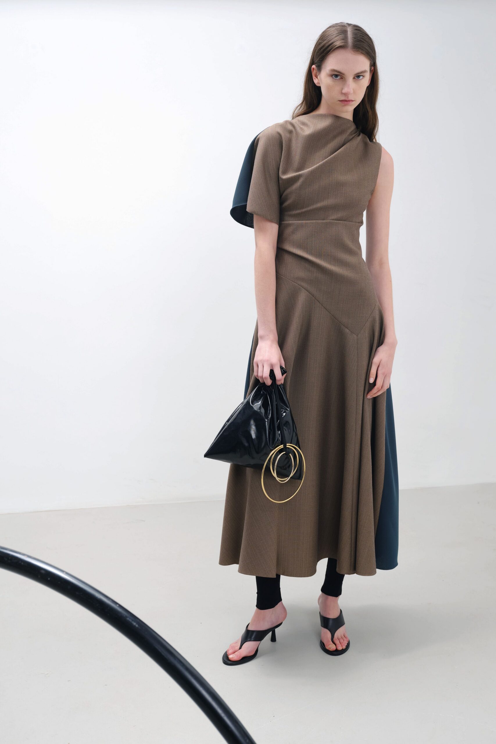 brown asymmetric midi dress with black accessories