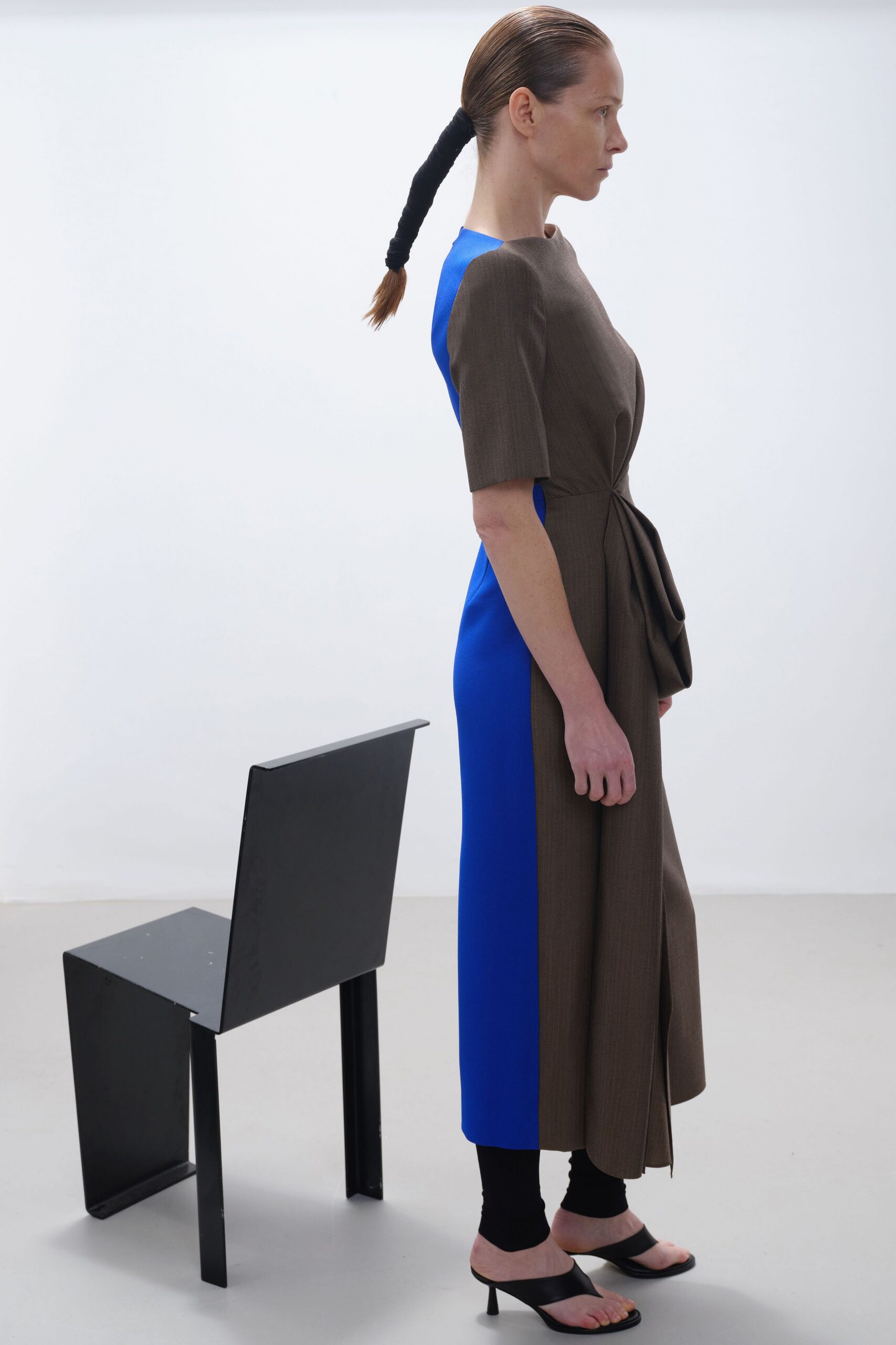 asymmetric brown and blue midi dress with strappy shoes