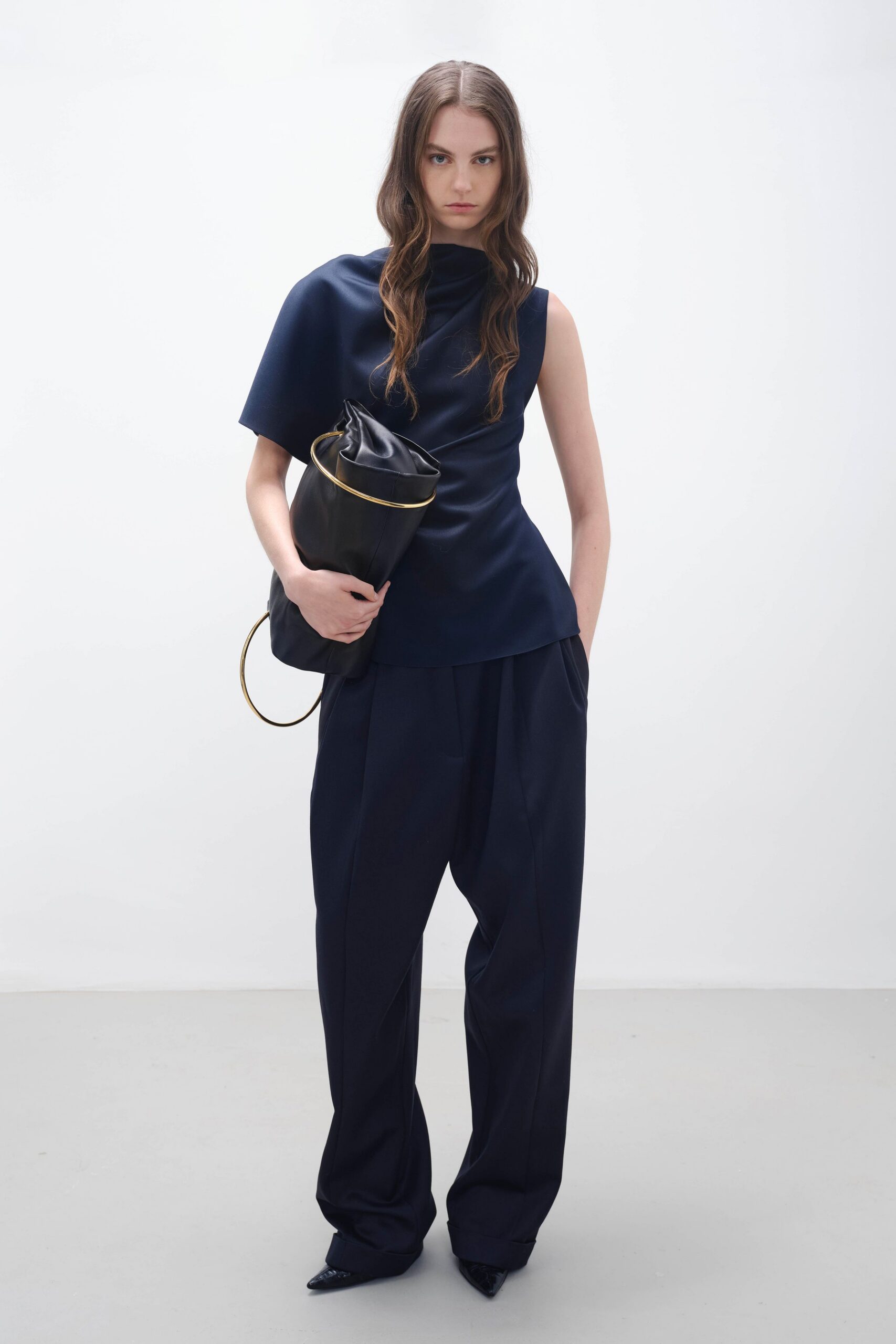 navy silk asymmetric top with wide-leg pants