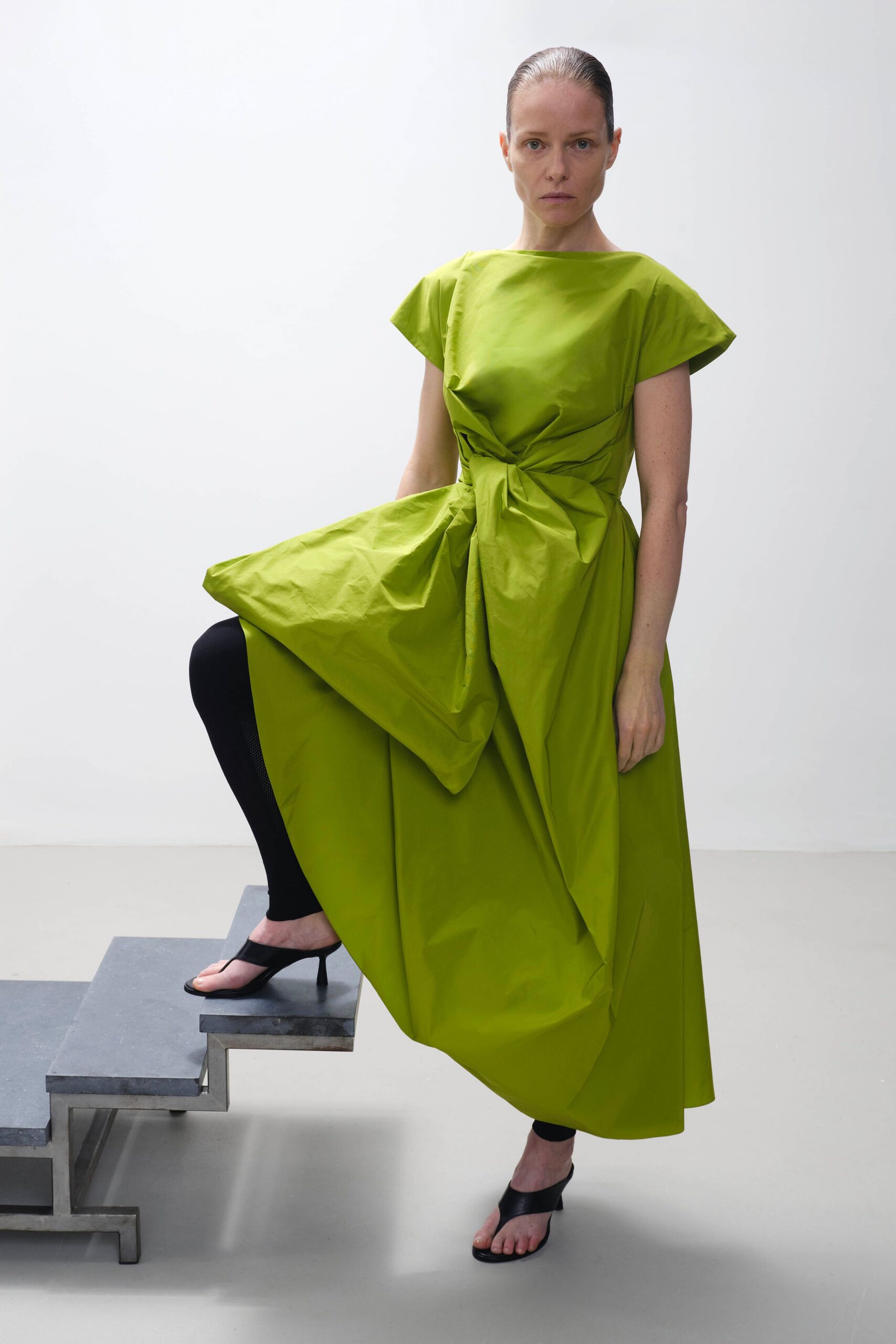 green cotton sleeveless high-neck fitted draped tiered dress