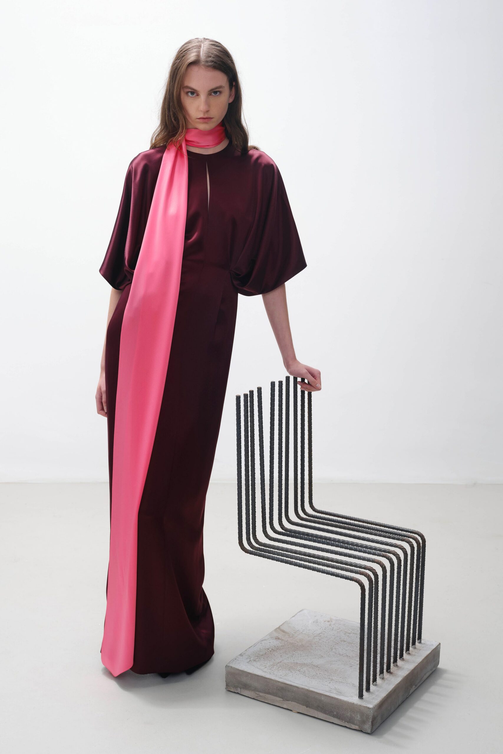 maroon silk draped gown