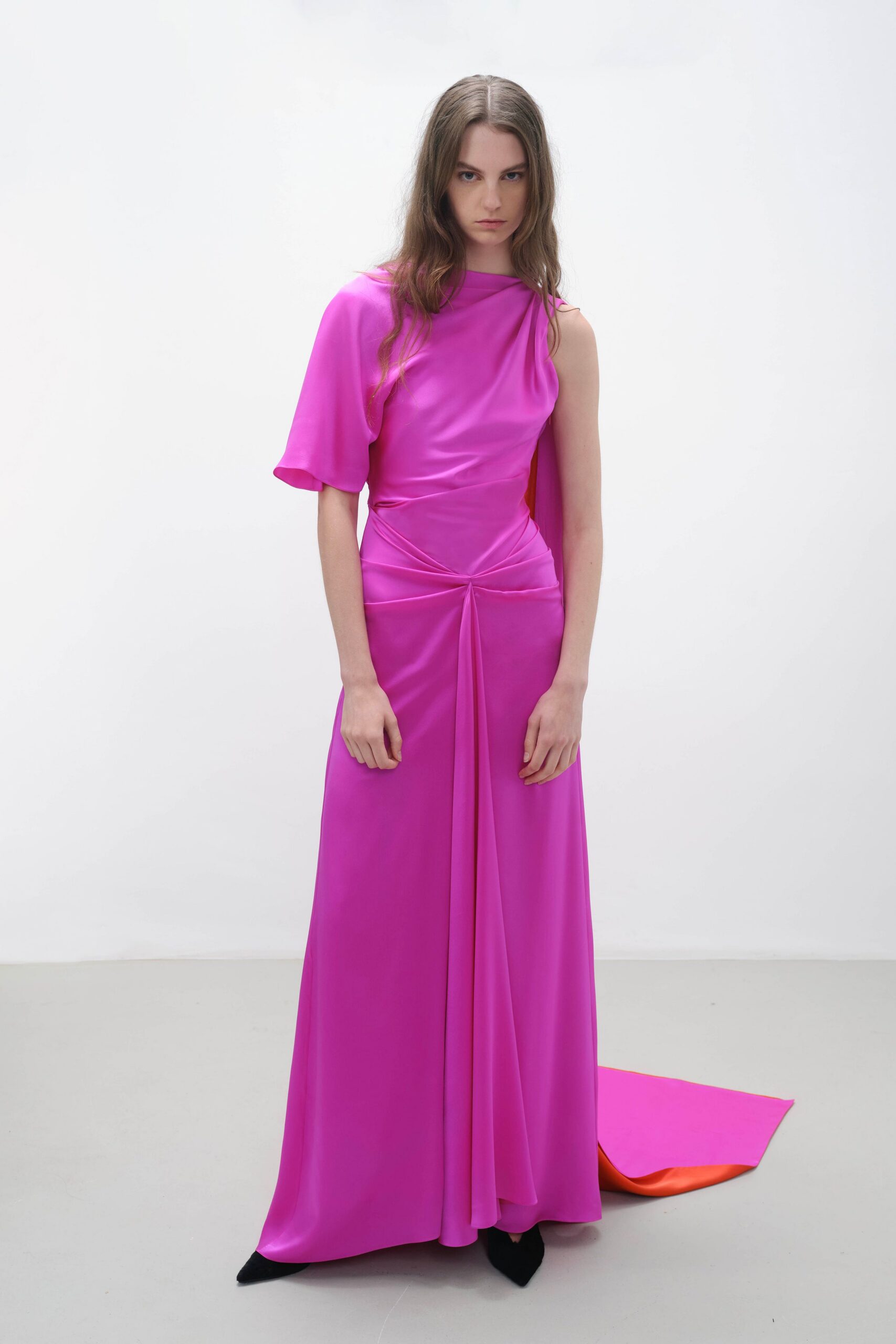 pink silk sleeveless high-neck fitted draped flowing gown