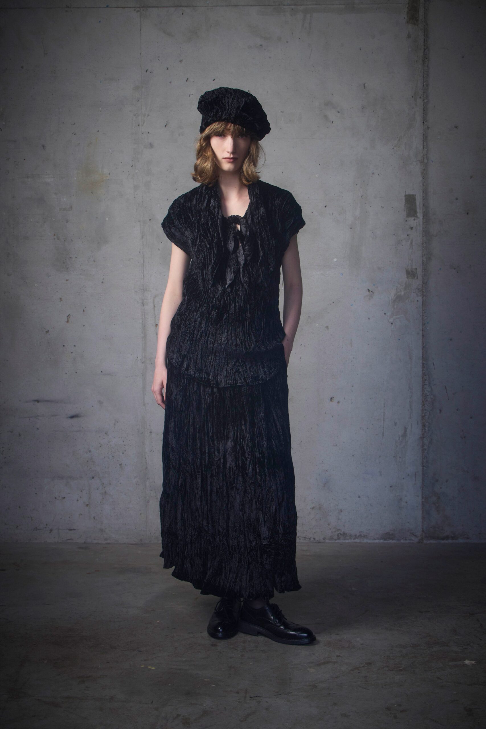 black pleated top and skirt
