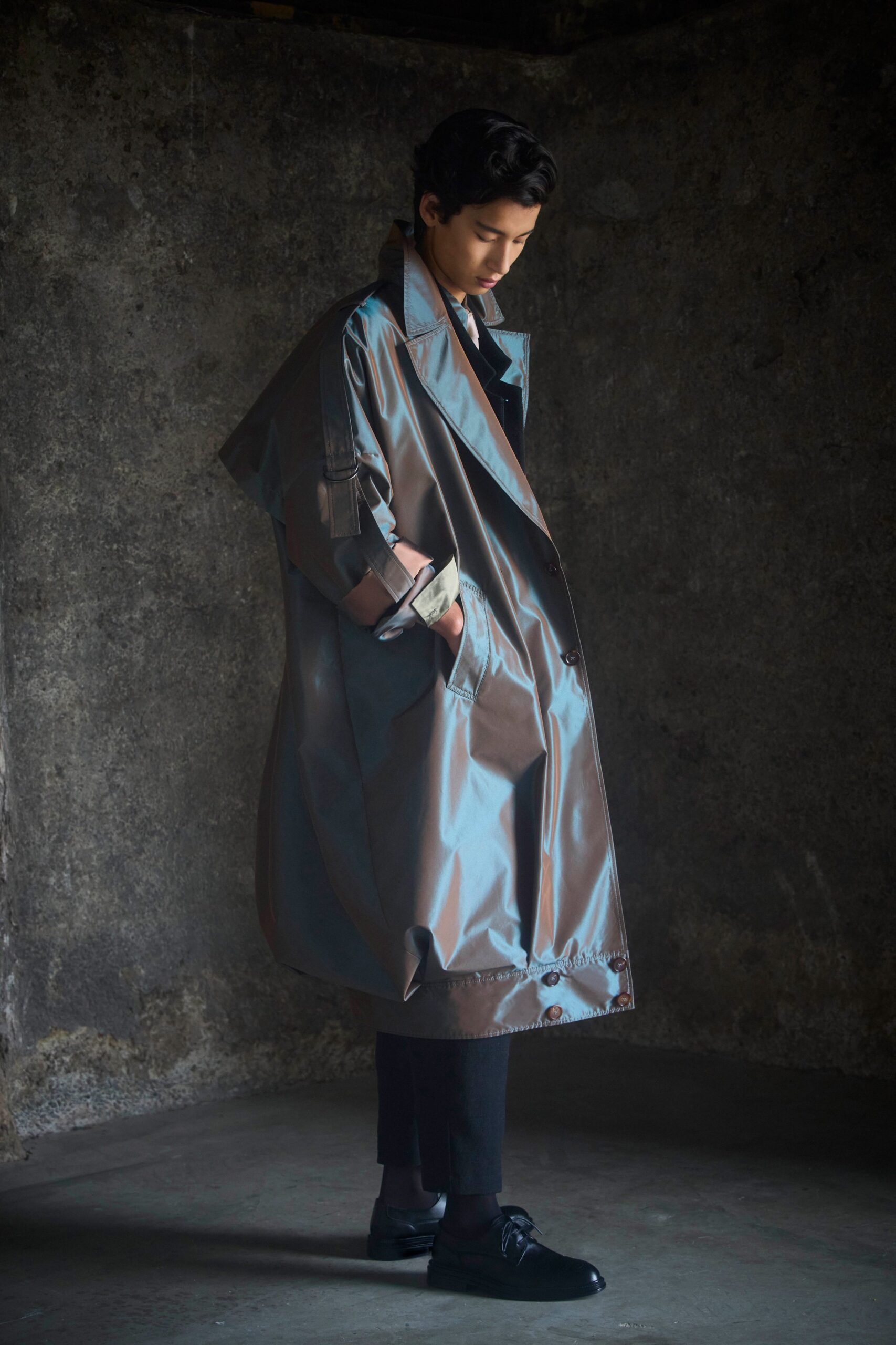 gray vinyl long-sleeve collared oversized buttoned pockets trench