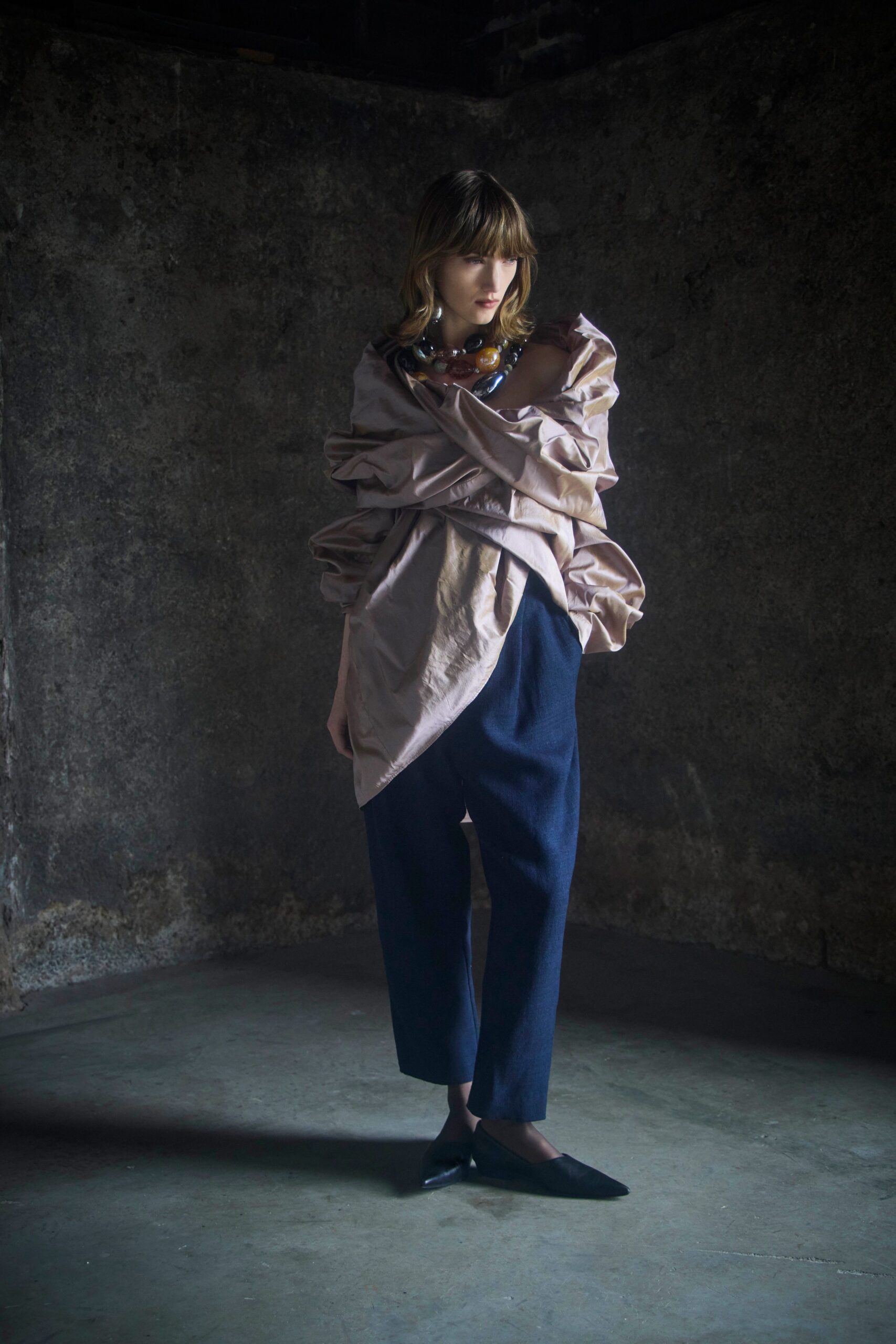 pink silk relaxed top with blue pants