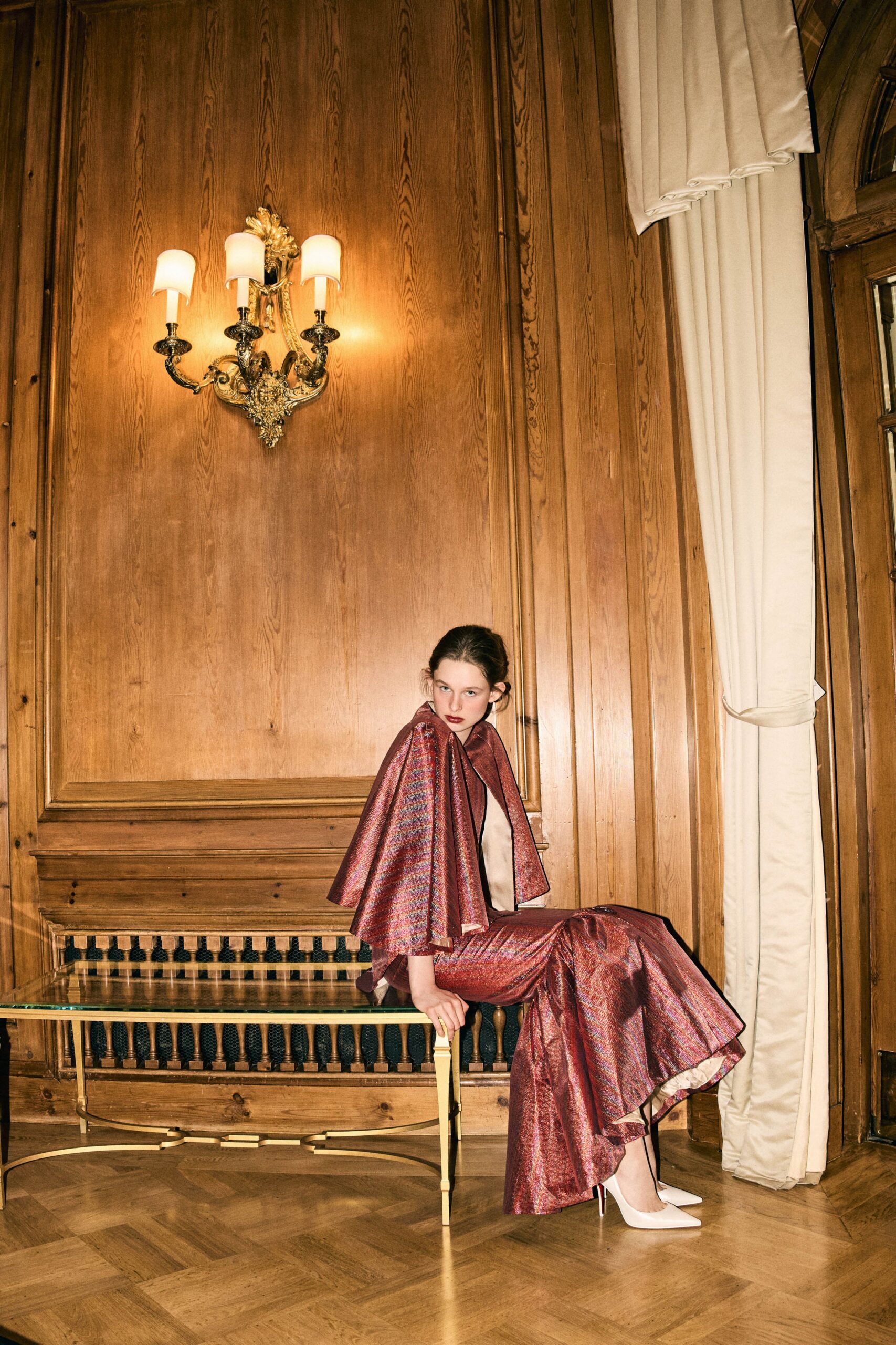 red silk sleeveless high-neck fitted pleated shiny gown