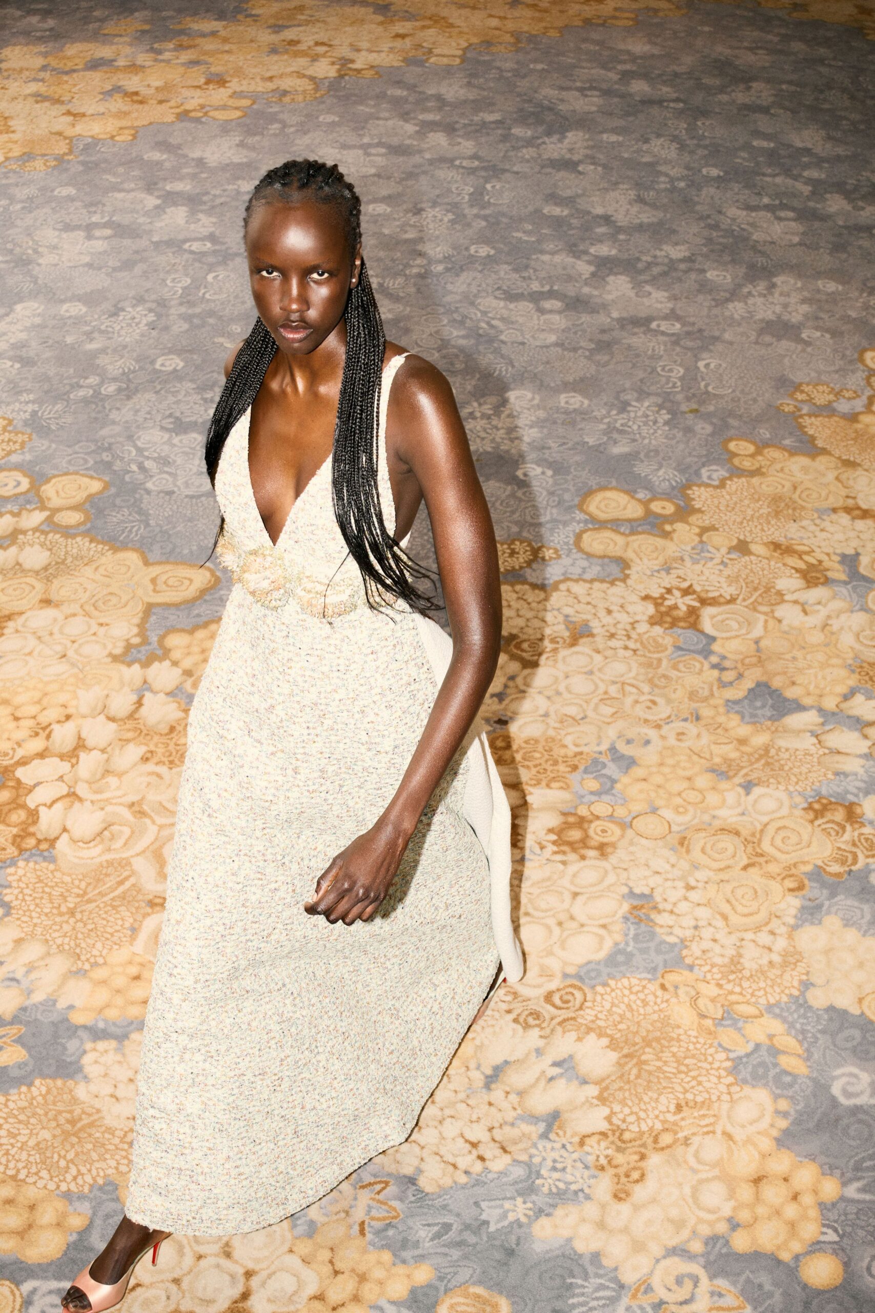 beige silk sleeveless v-neck fitted flared maxi gown