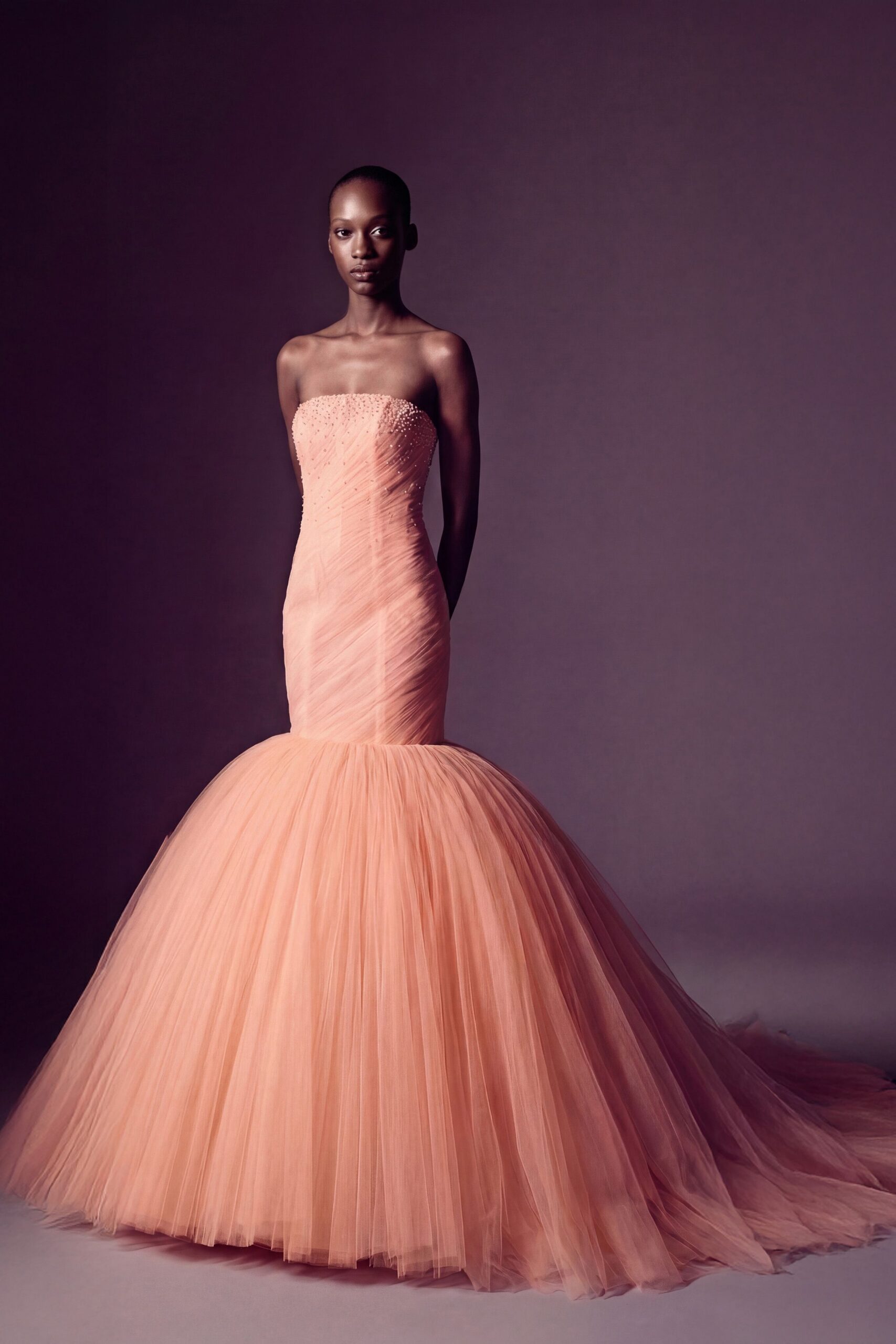 peach strapless pleated gown